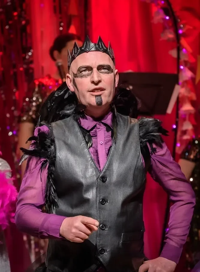 Performer as Carabosse in a production of Sleeping Beauty pantomime script