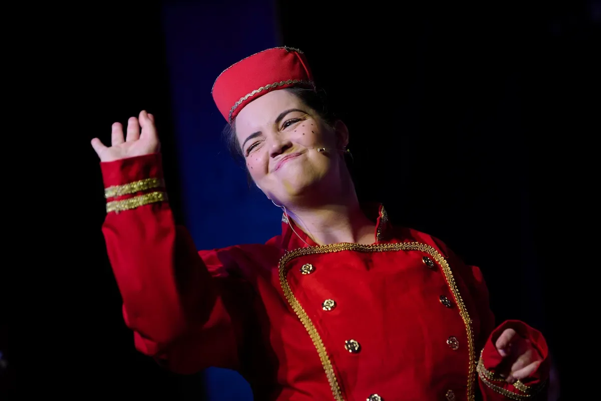 Performer in Cinderella pantomime production