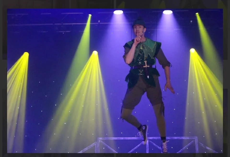 An actor flying through the air in Peter Pan