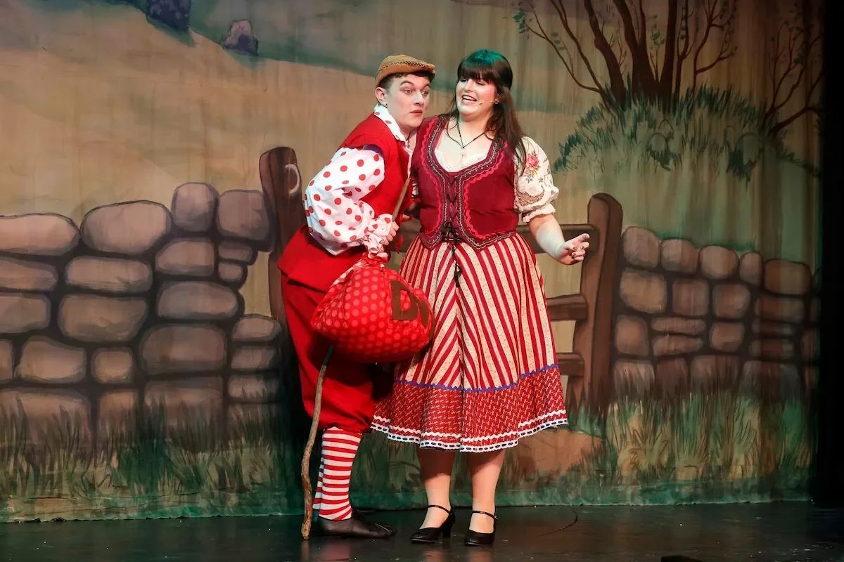 Alice and Dick meet on the London Road in a Dick Whittington pantomime script production photo