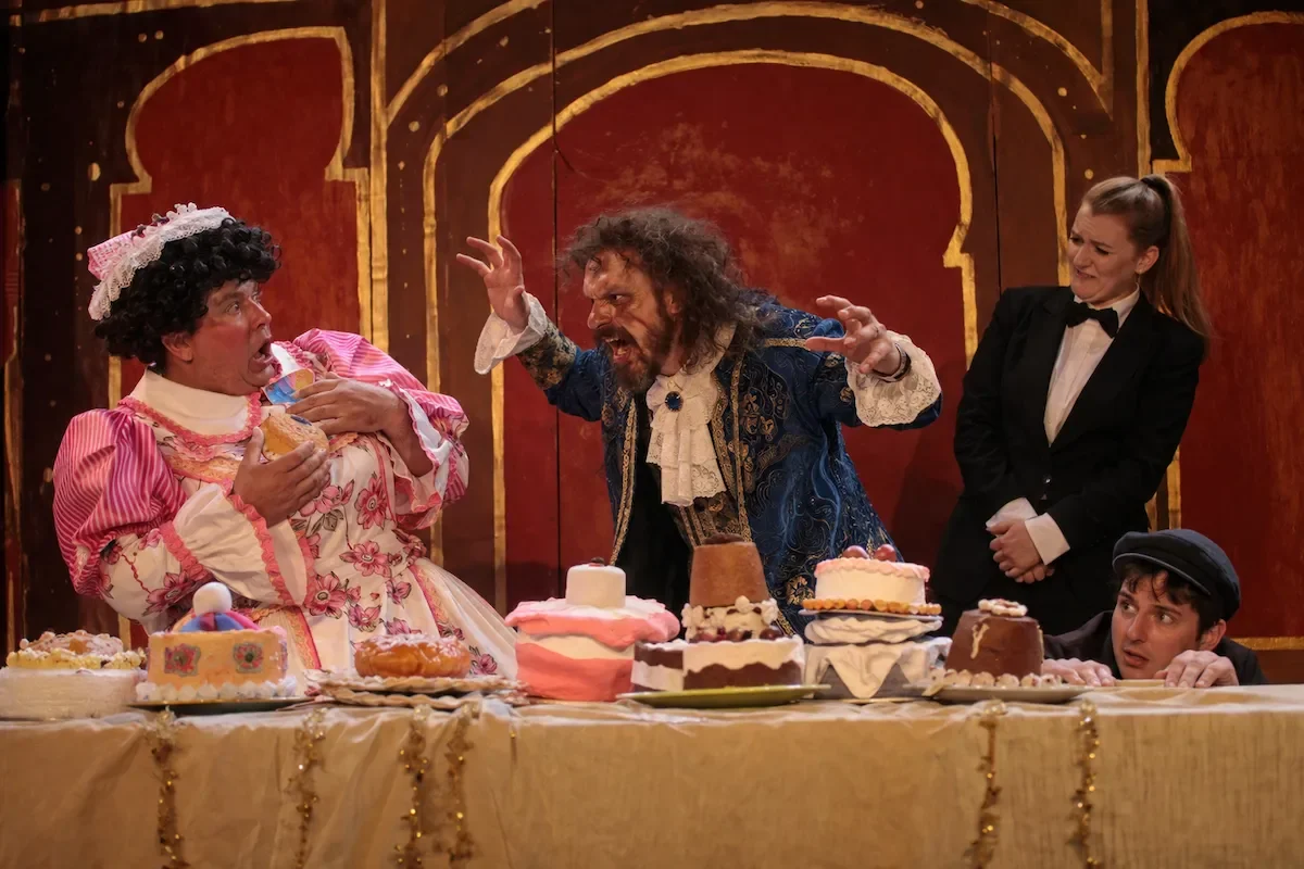 The Beast and Dame Dotty Doolally in the castle feast