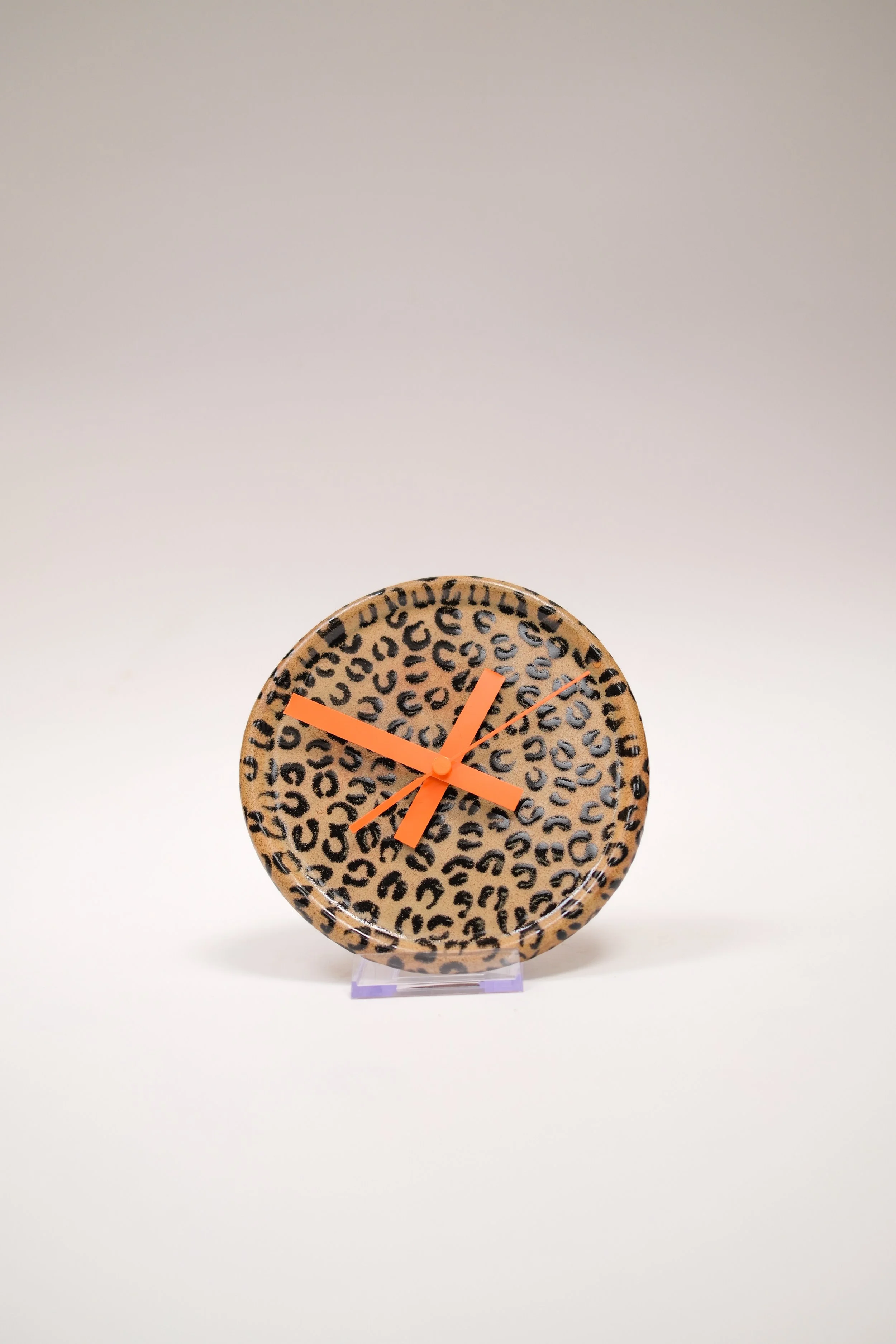 Wanduhr Leoprint orange klein