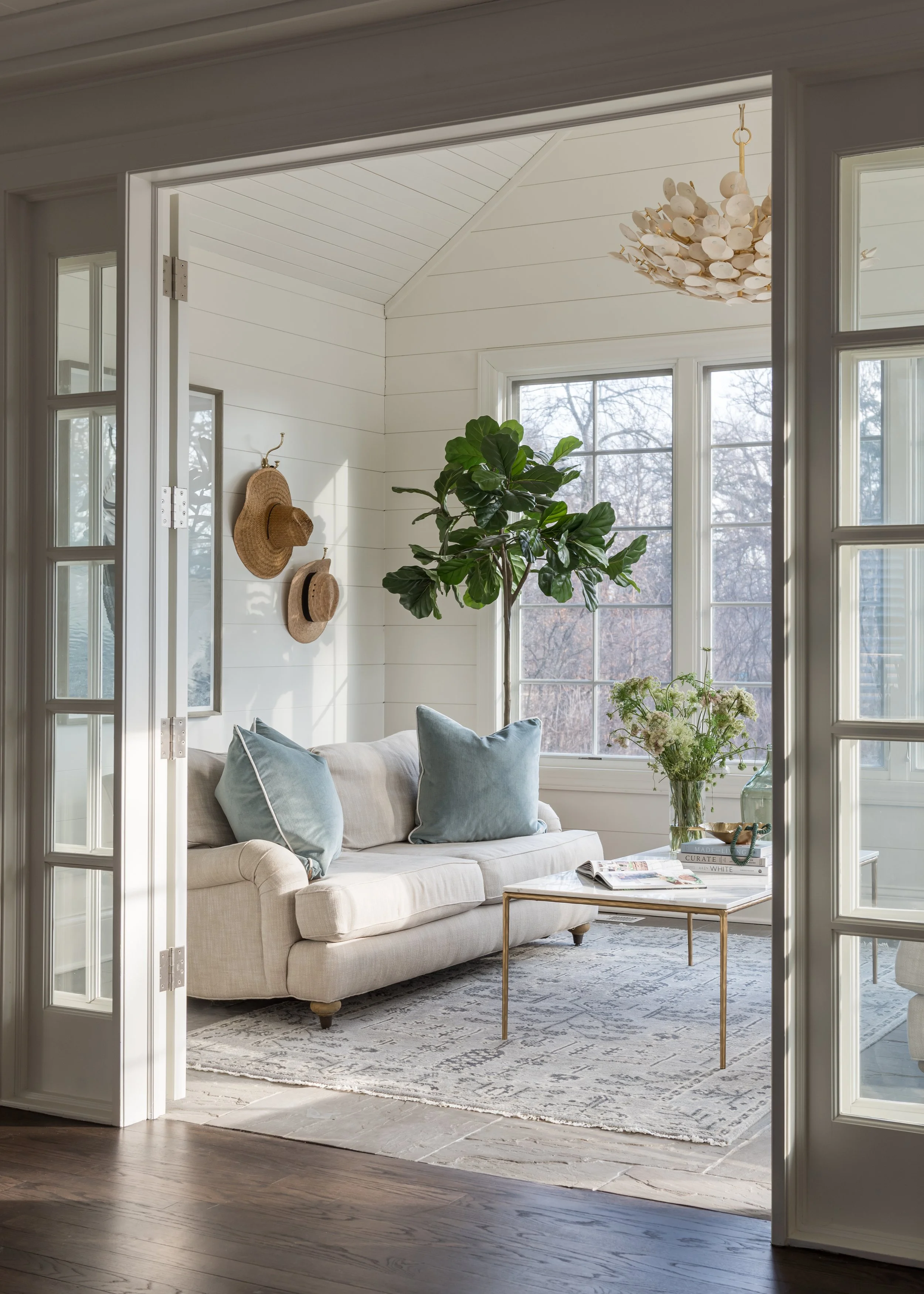 Tranquil Blue Sunroom with Woven Textures & Natural Light — Sarah Coe ...