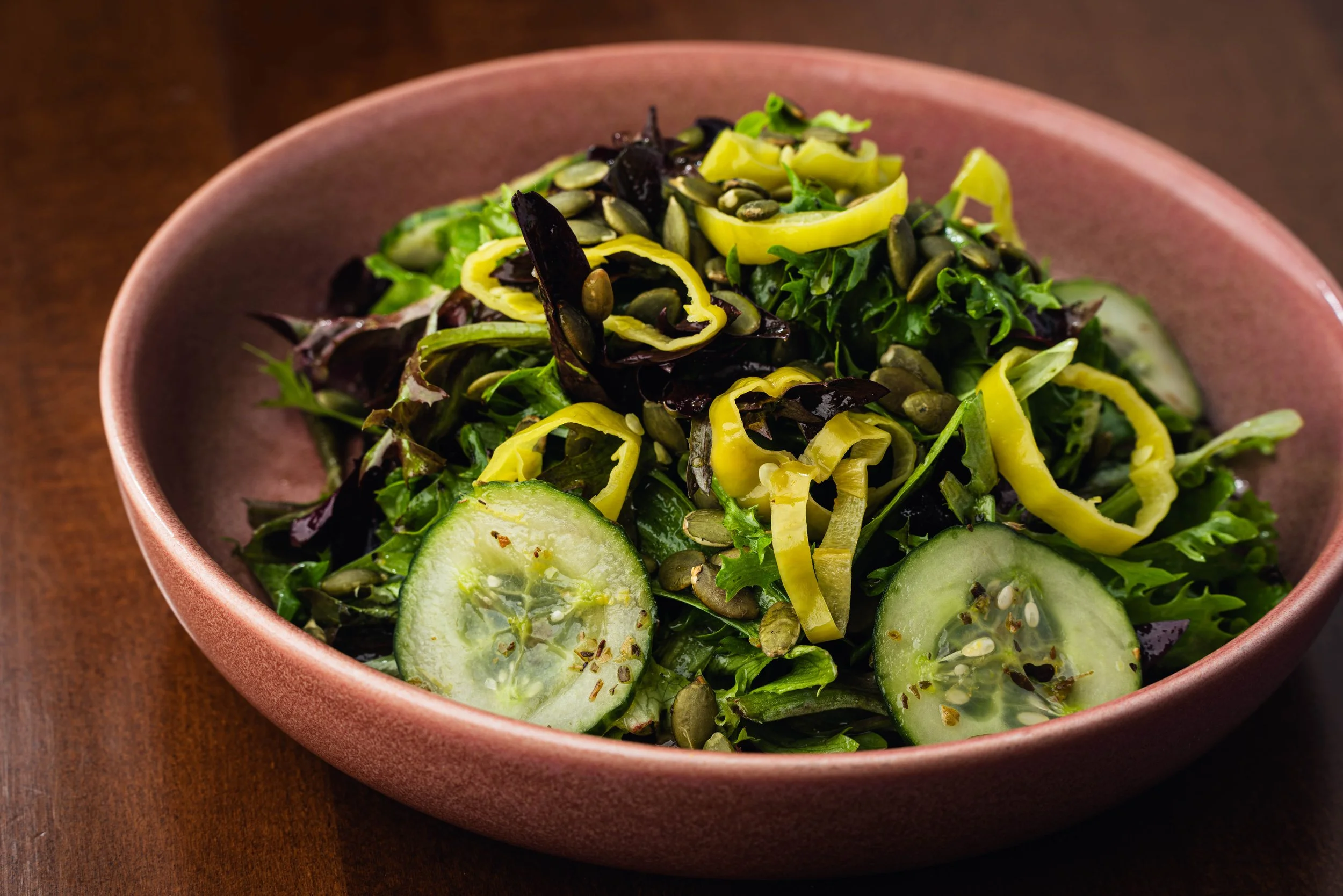 Simple Green Salad - Spring mix, pepperoncini, pumpkin seeds, Italian herb vinaigrette