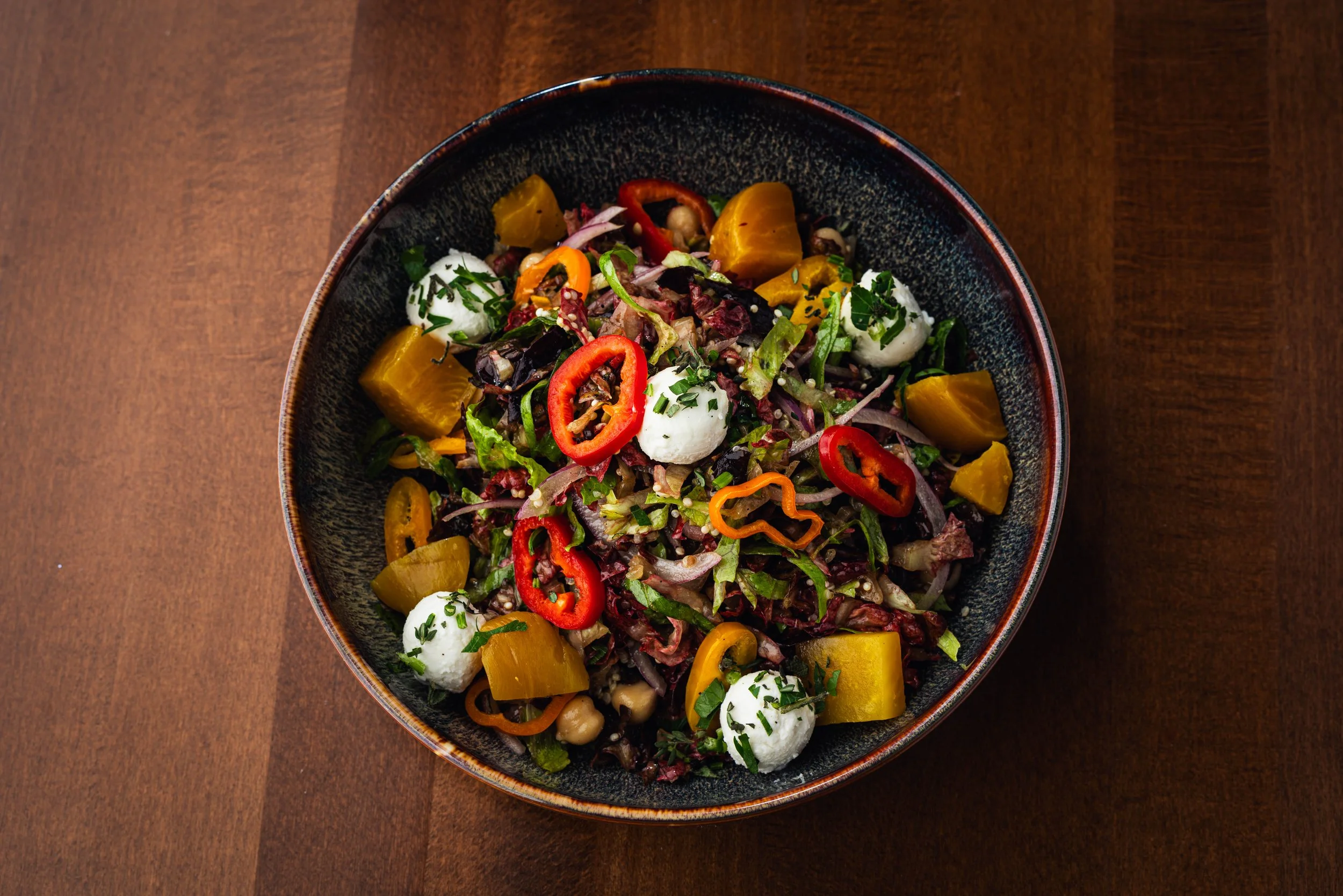 Chopped Salad - Beets, chickpeas, quinoa, red rhone gem lettuce, herbed goat cheese, baby
bell peppers, red onion, roasted shallot vinaigrette