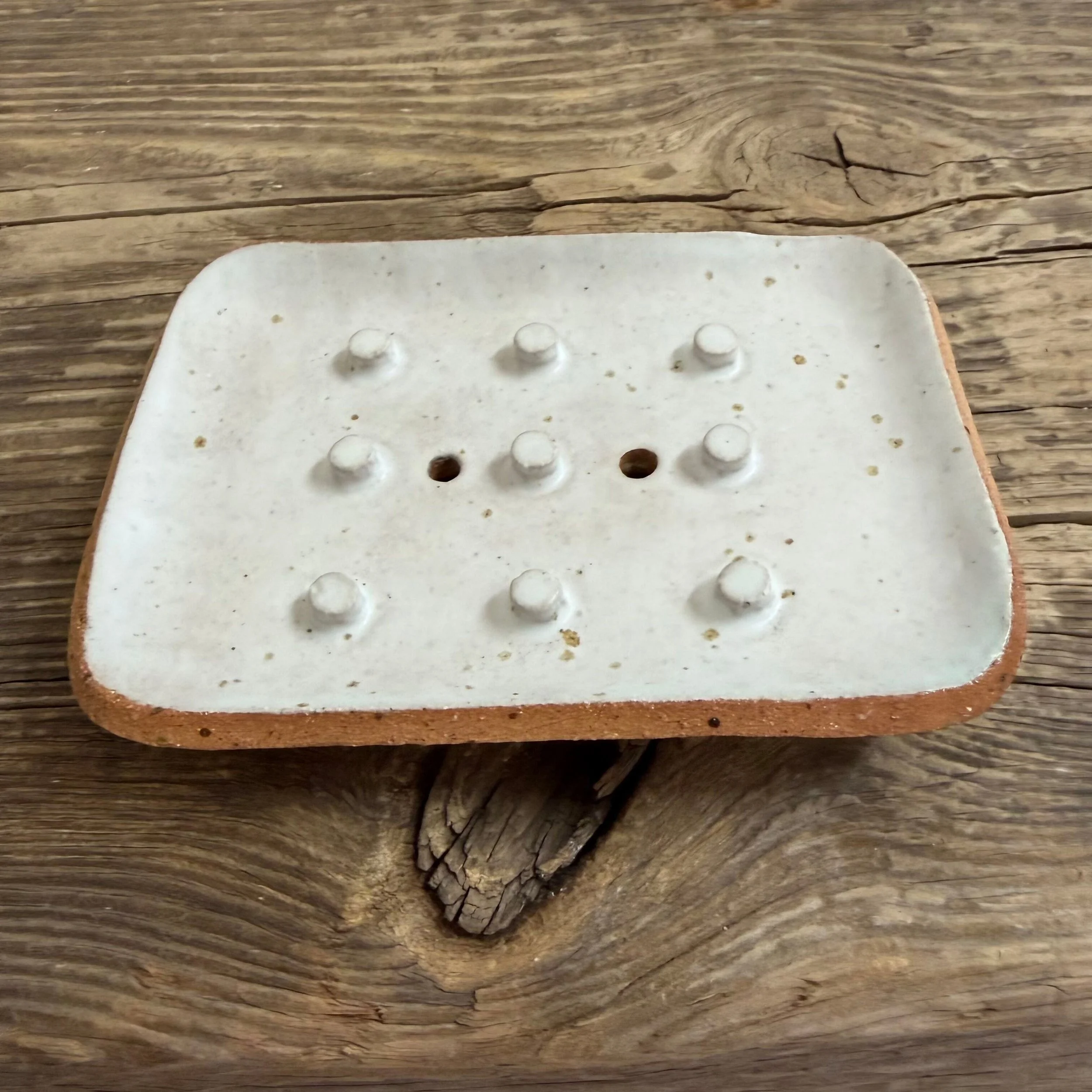 beautifully handcrafted soap dish, crafted from speckled stoneware clay and finished with a soft satin white glaze.