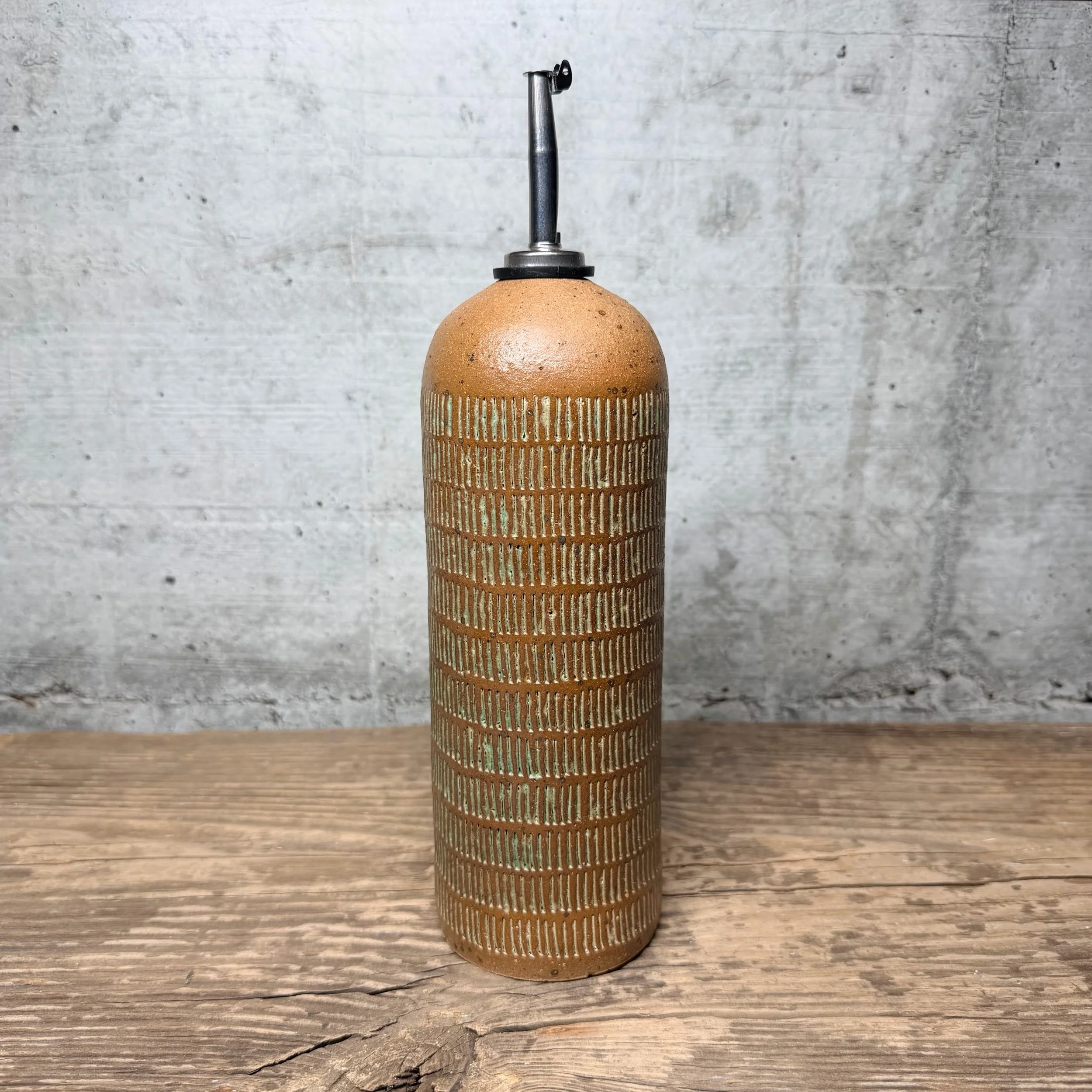 Handmade ceramic oil bottle