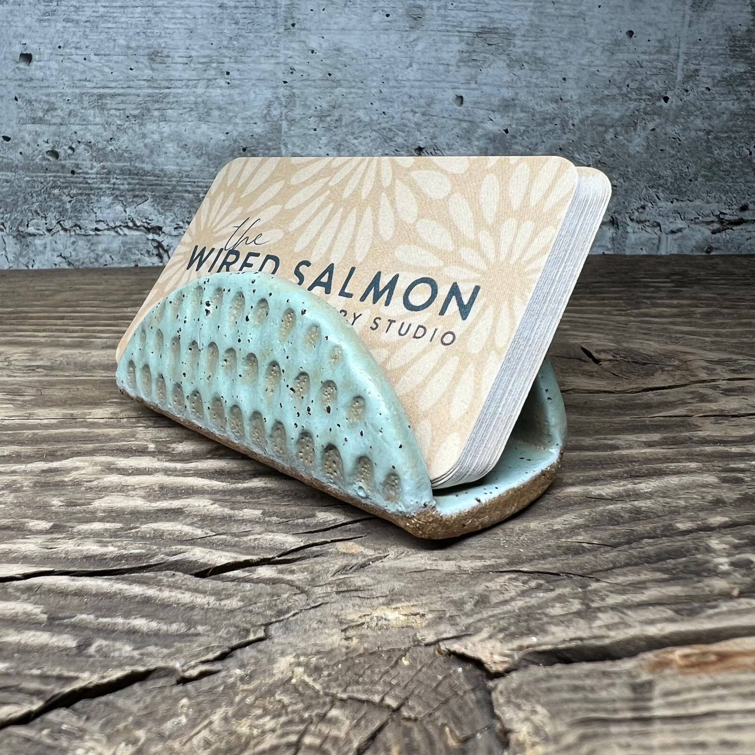 A handmade ceramic business card holder with a matte mint finish and subtle texture. (Copy) (Copy)