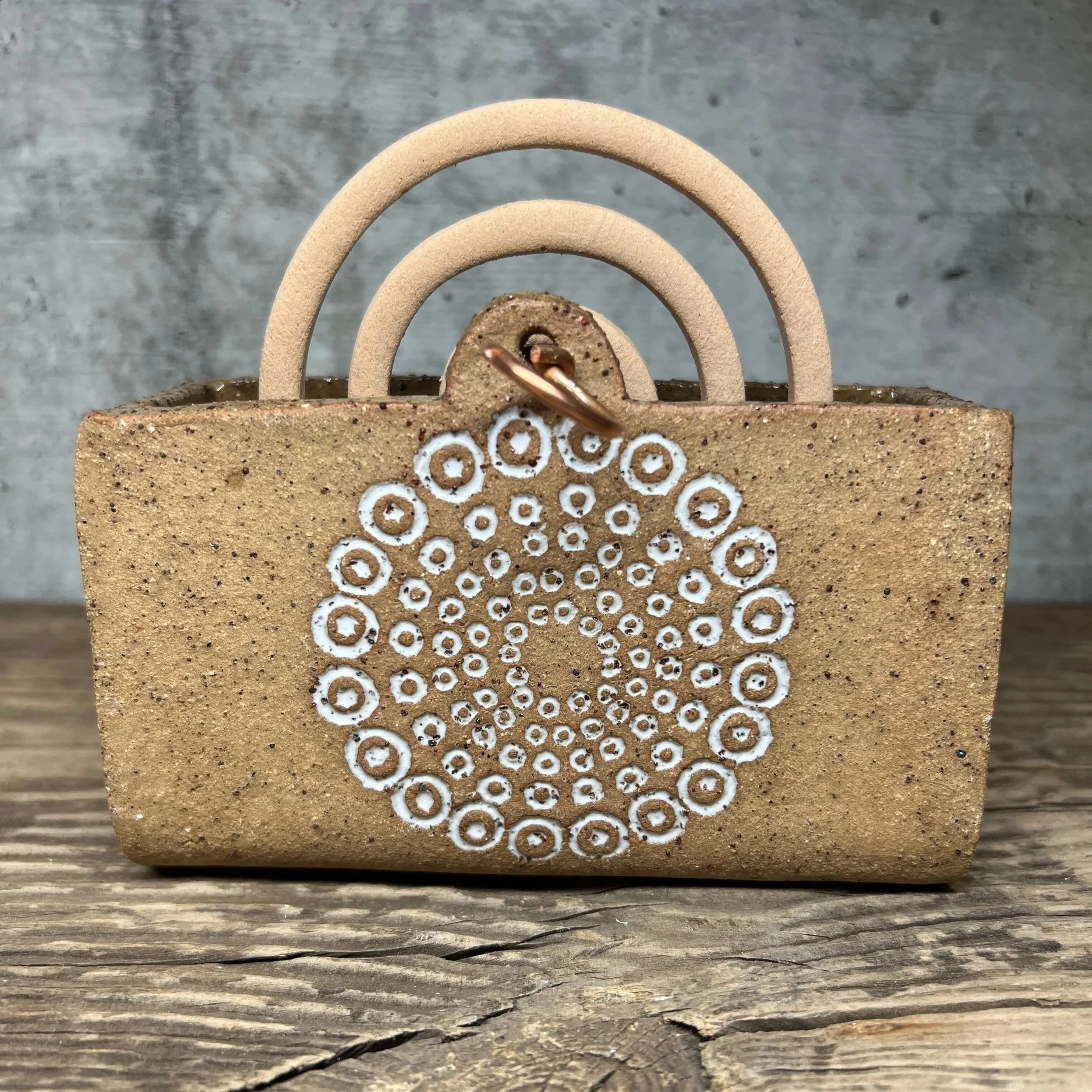 handcrafted mozzie coil holder, made from durable stoneware clay and finished with a white glaze inlay white.