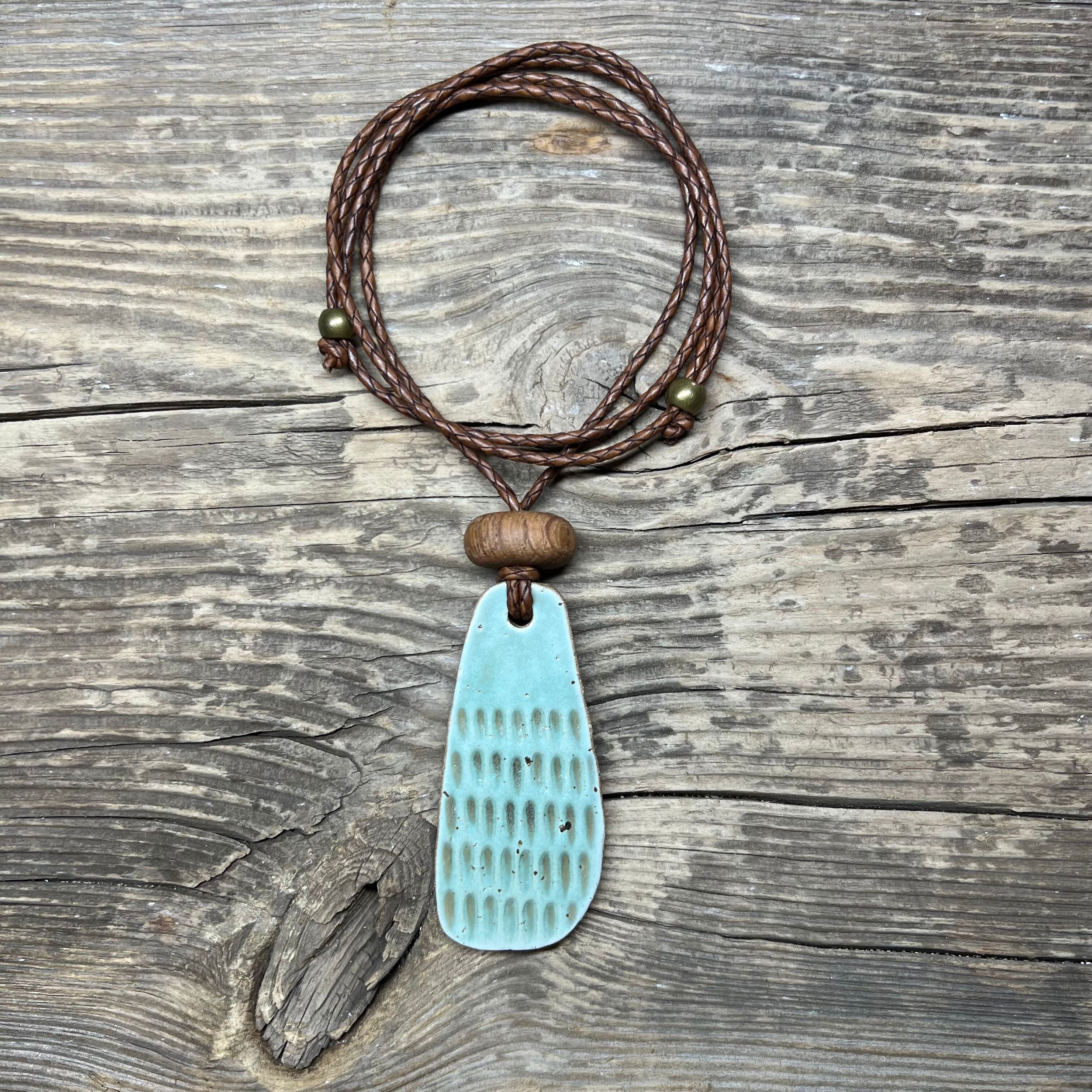 stoneware clay pendant and wooden bead in mint.