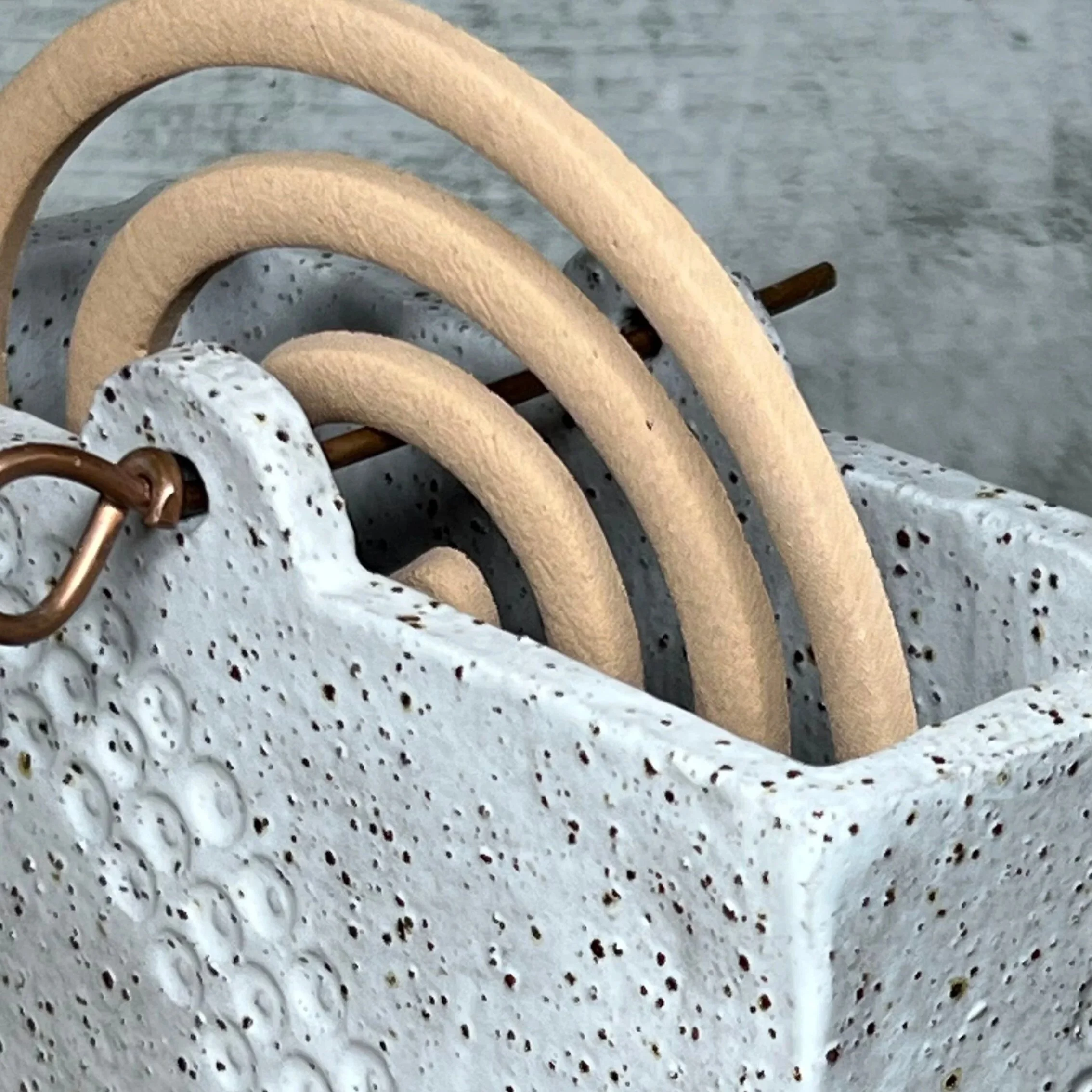 handcrafted mozzie coil holder, made from durable stoneware clay and finished in white.