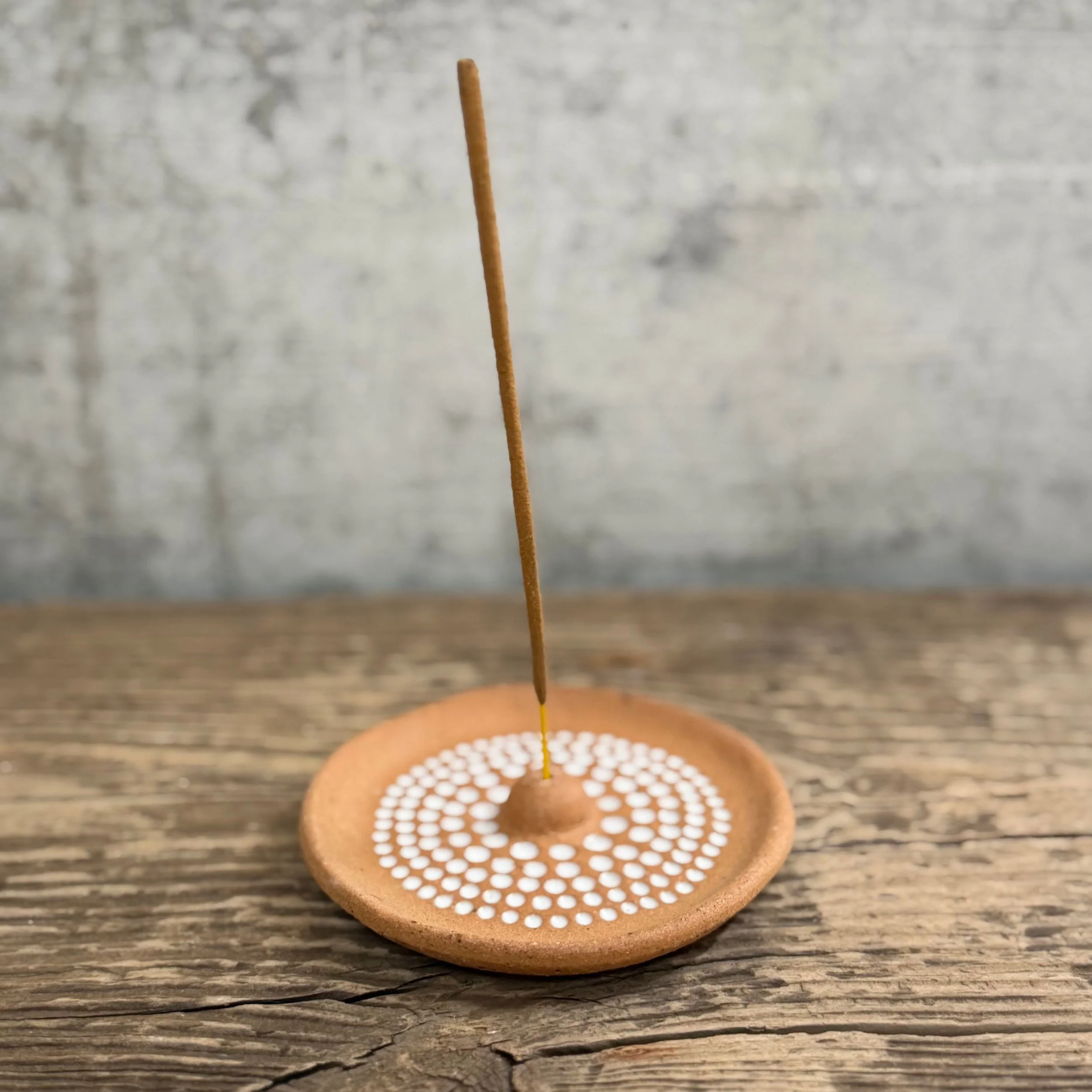 handcrafted incense holder, made from stoneware clay and finished with a white glaze inlay.