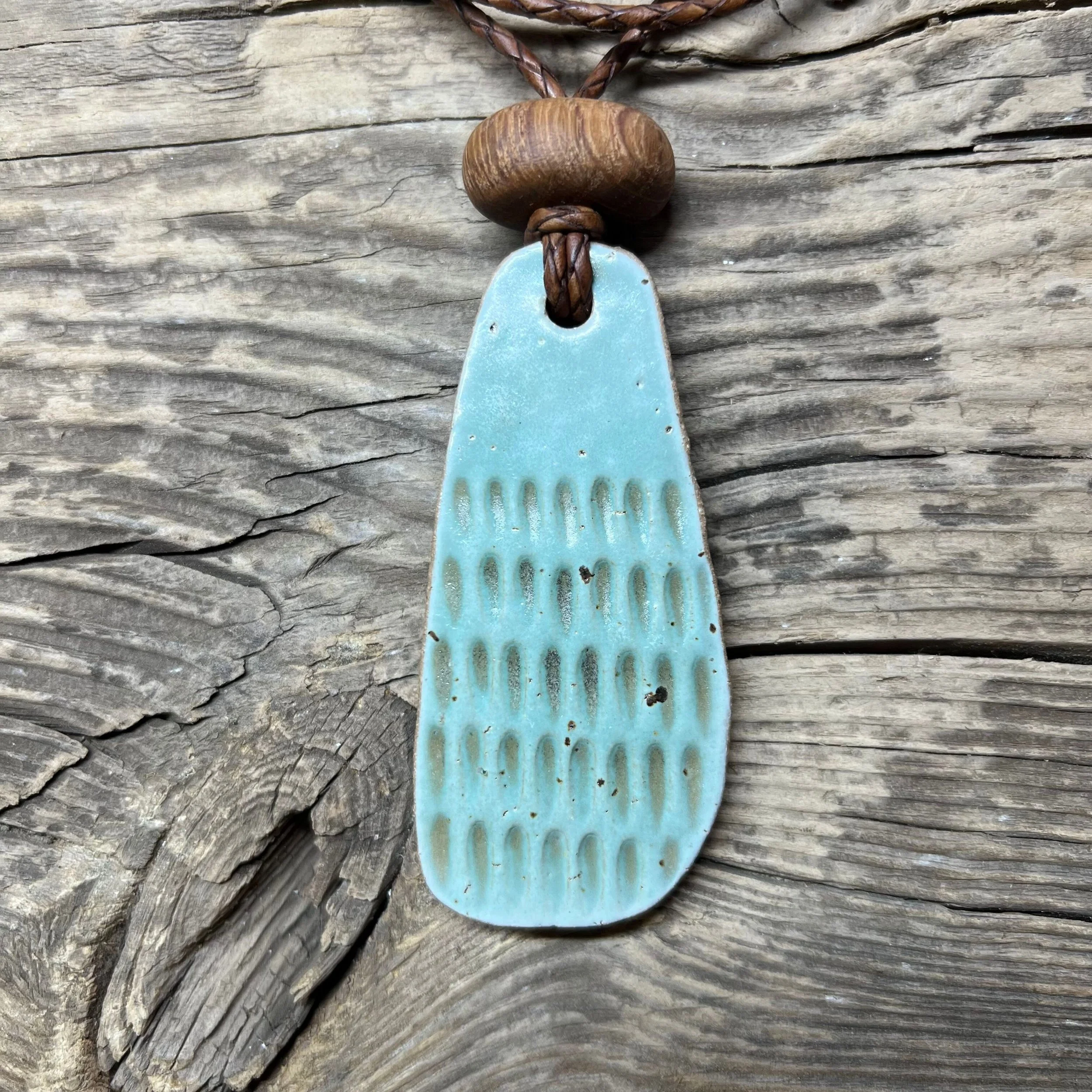 stoneware clay pendant and wooden bead in mint.