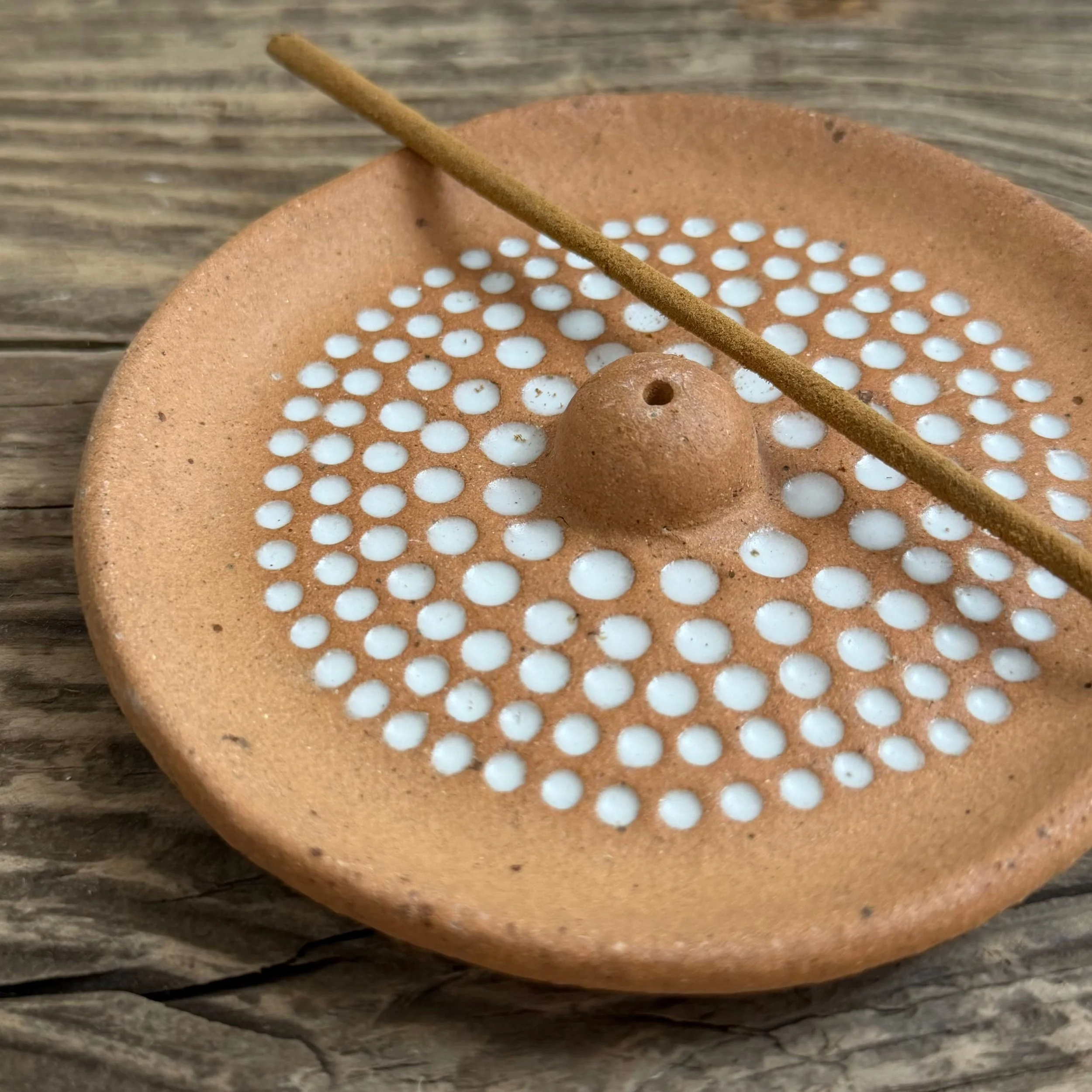 handcrafted incense holder, made from stoneware clay and finished with a white glaze inlay.