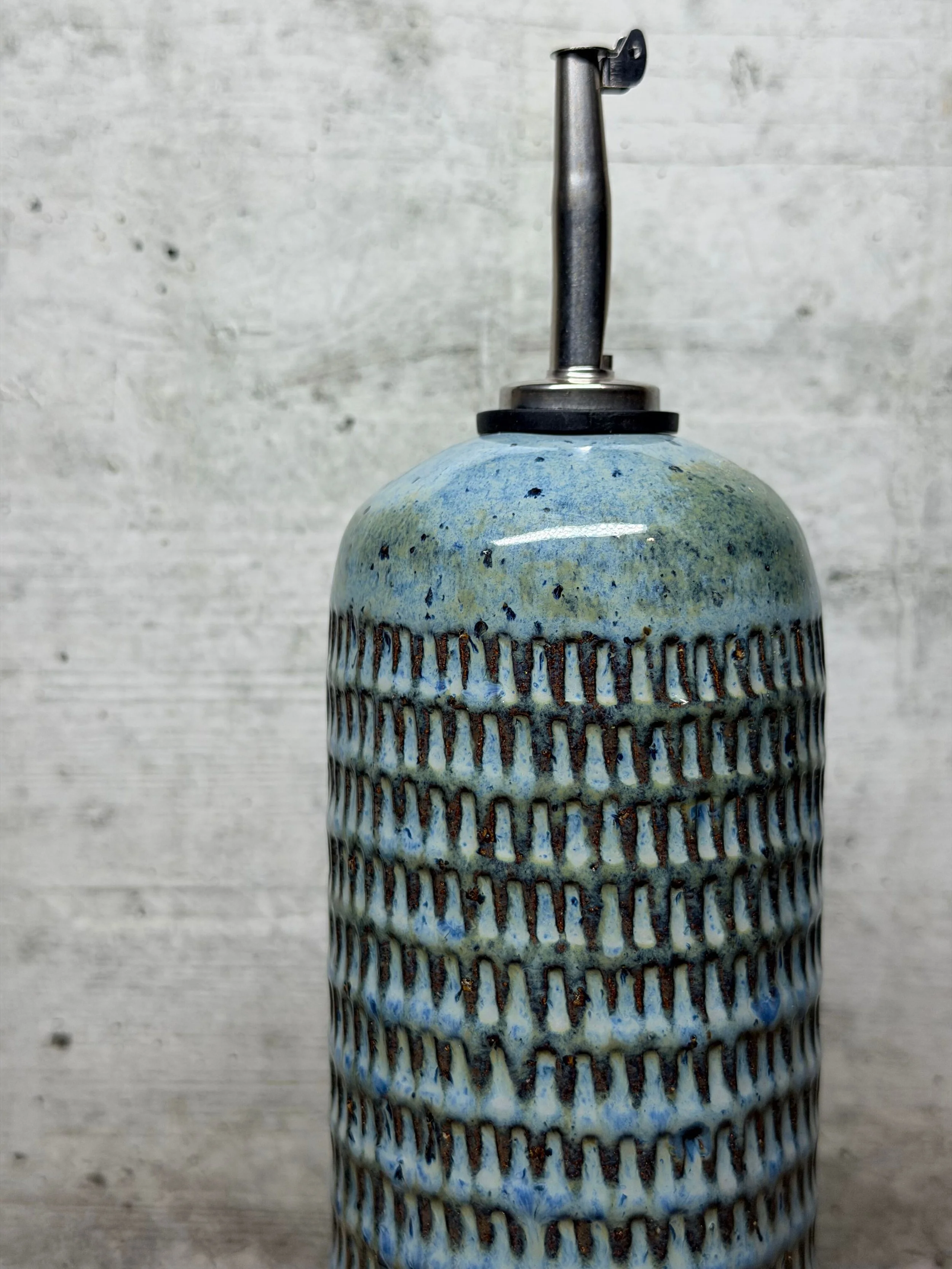 Handmade ceramic oil bottle