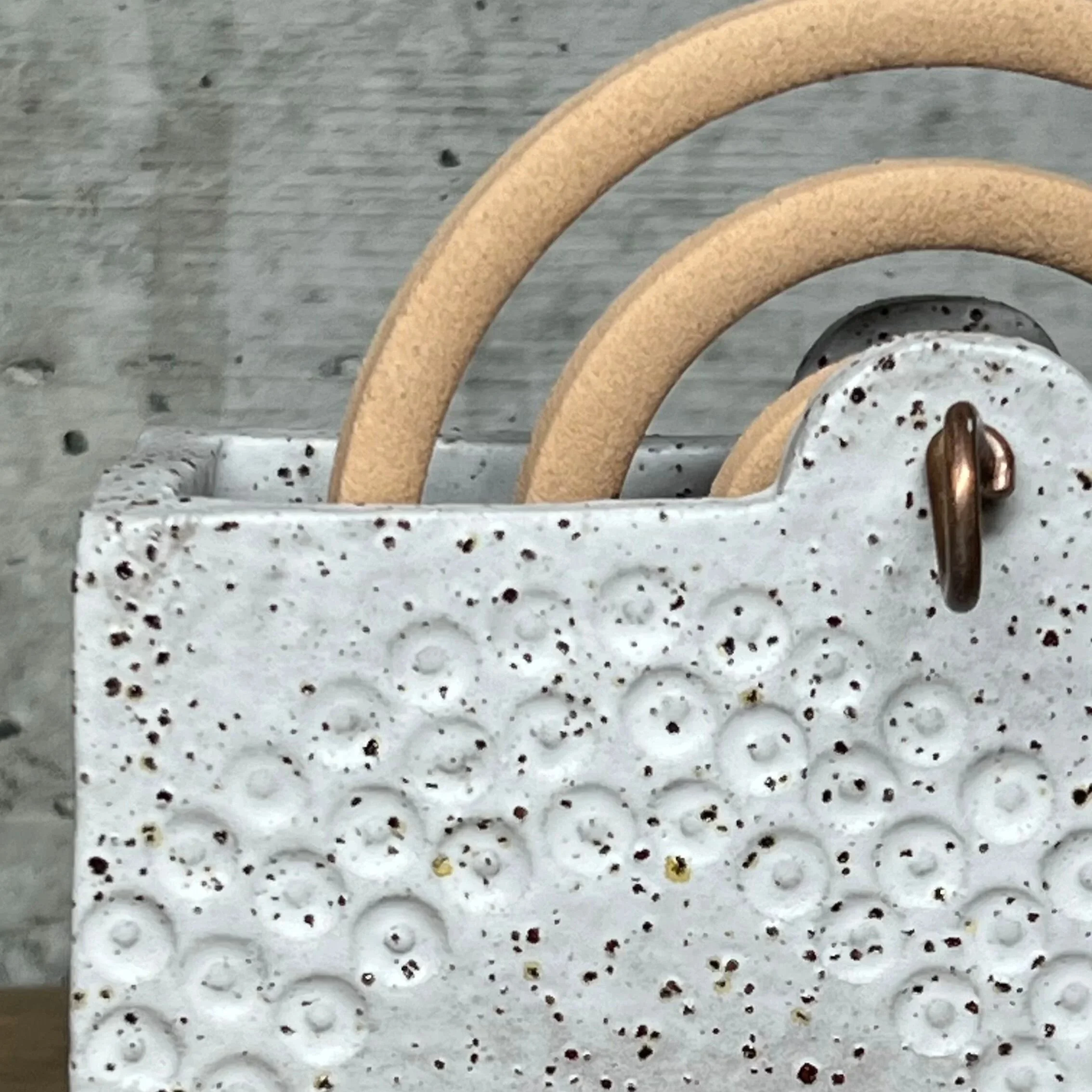 handcrafted mozzie coil holder, made from durable stoneware clay and finished in white.