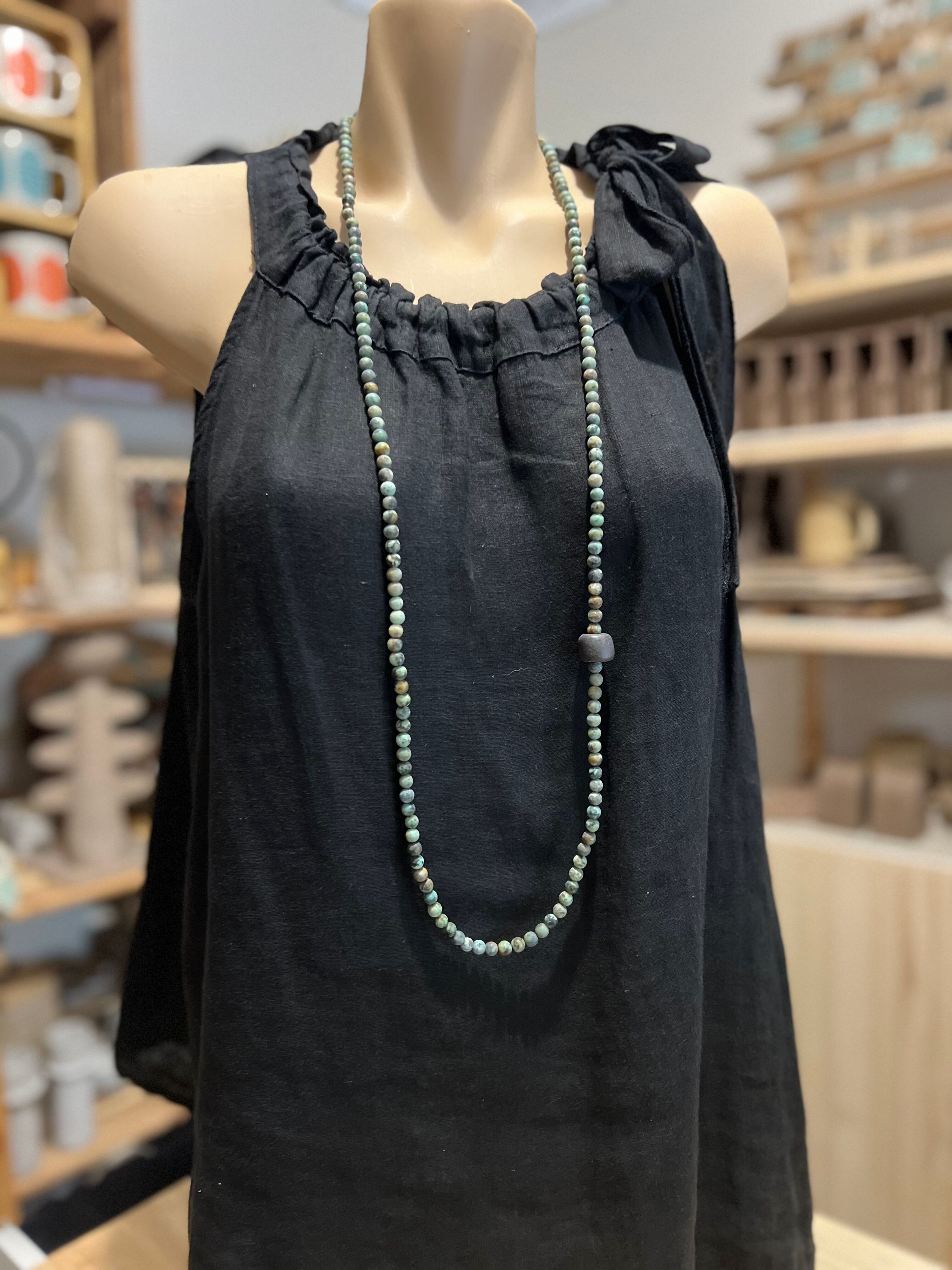 African Turquoise necklace with a black clay bead