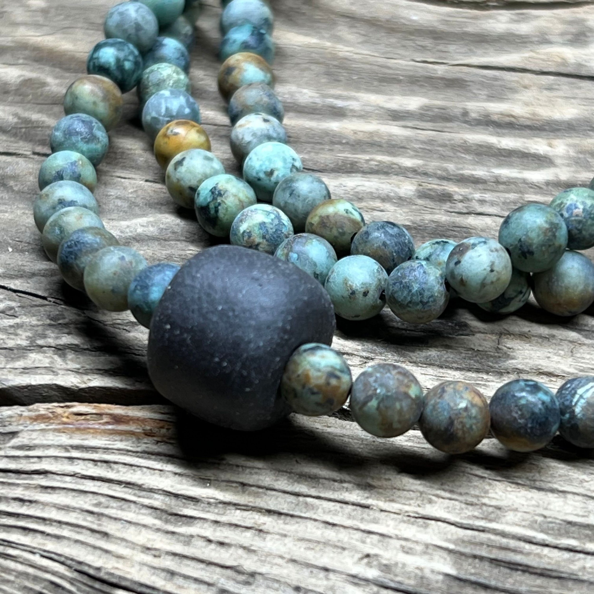 African Turquoise necklace with a black clay bead
