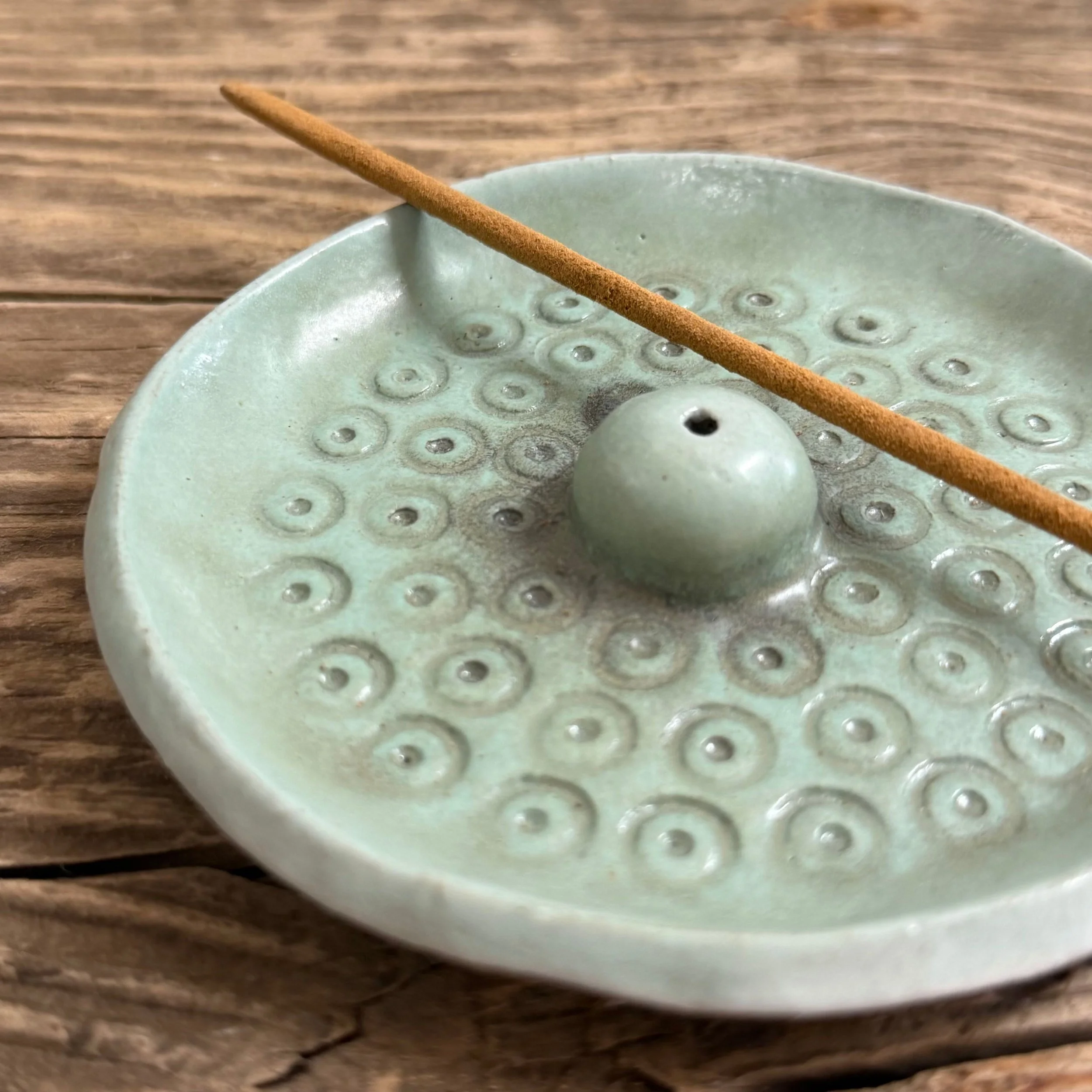 handcrafted incense holder, made from stoneware clay and finished in a soft matte mint glaze.
