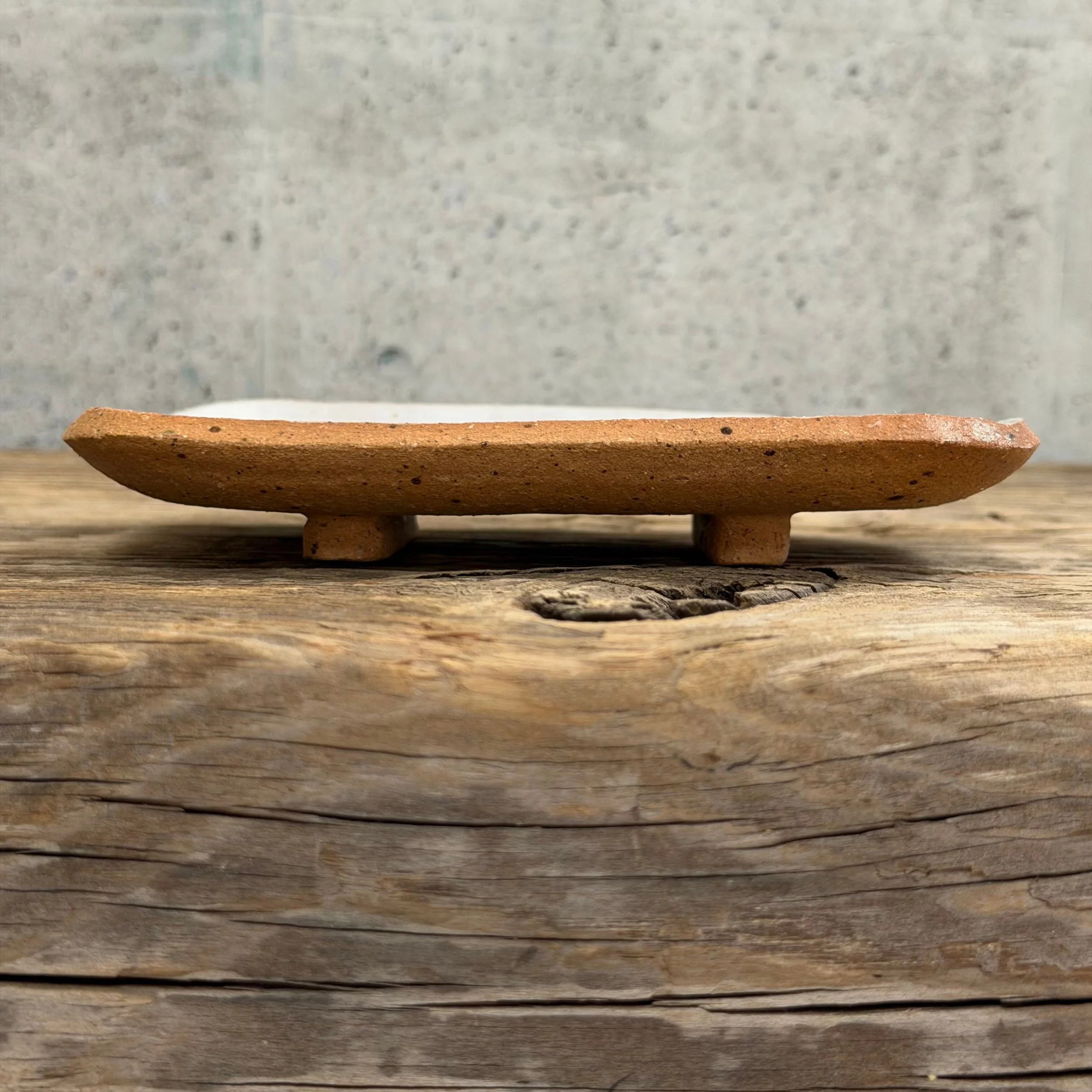 beautifully handcrafted soap dish, crafted from speckled stoneware clay and finished with a soft satin white glaze.