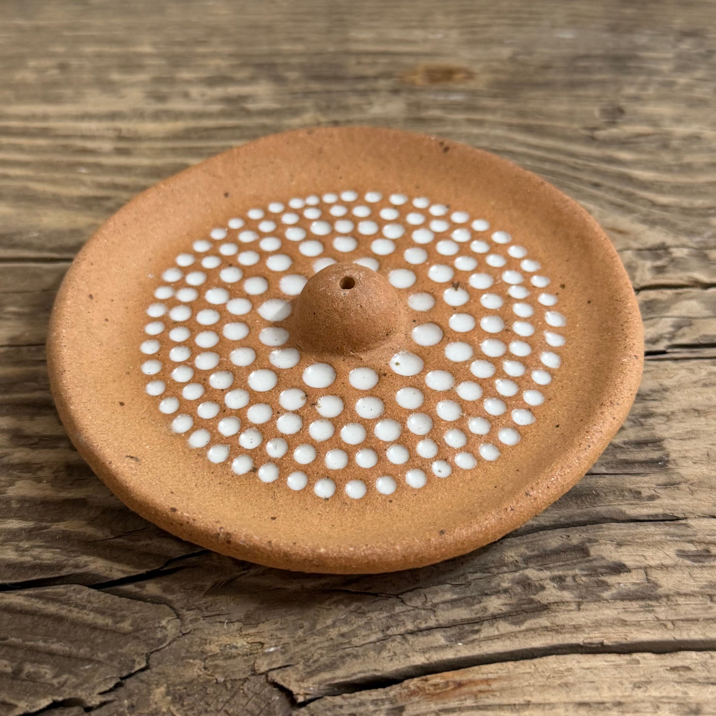 handcrafted incense holder, made from stoneware clay and finished with a white glaze inlay.