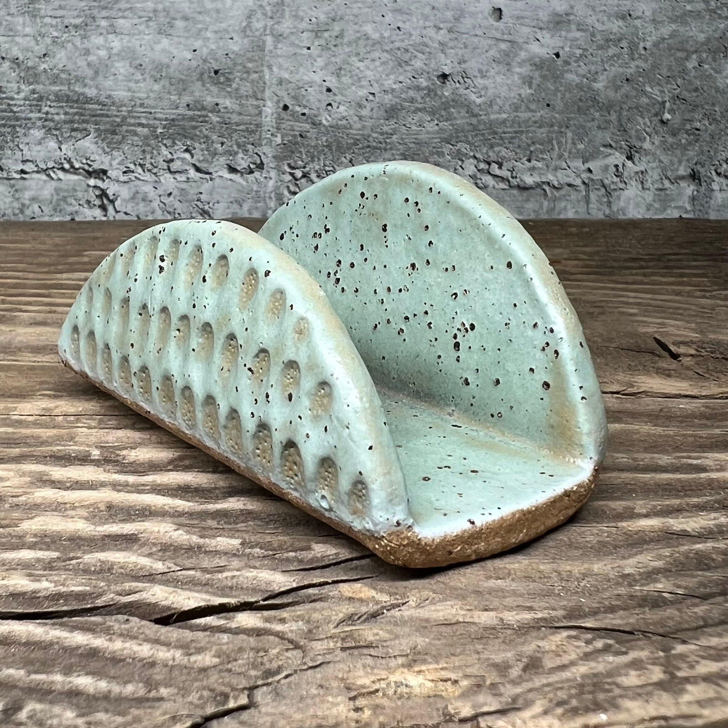 A handmade ceramic business card holder with a matte mint finish and subtle texture. (Copy) (Copy)