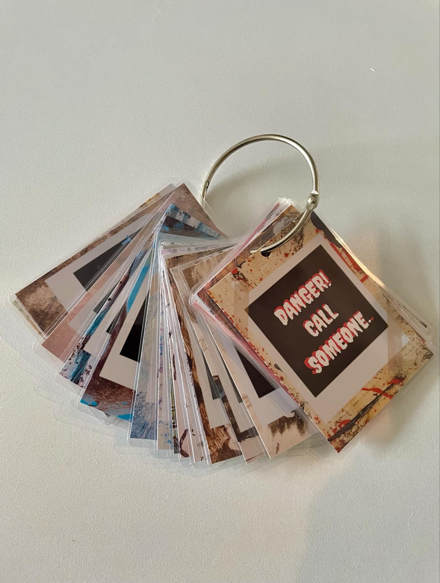 Here to Help Card for GEN X are shown face forward on metal ring for easy use.