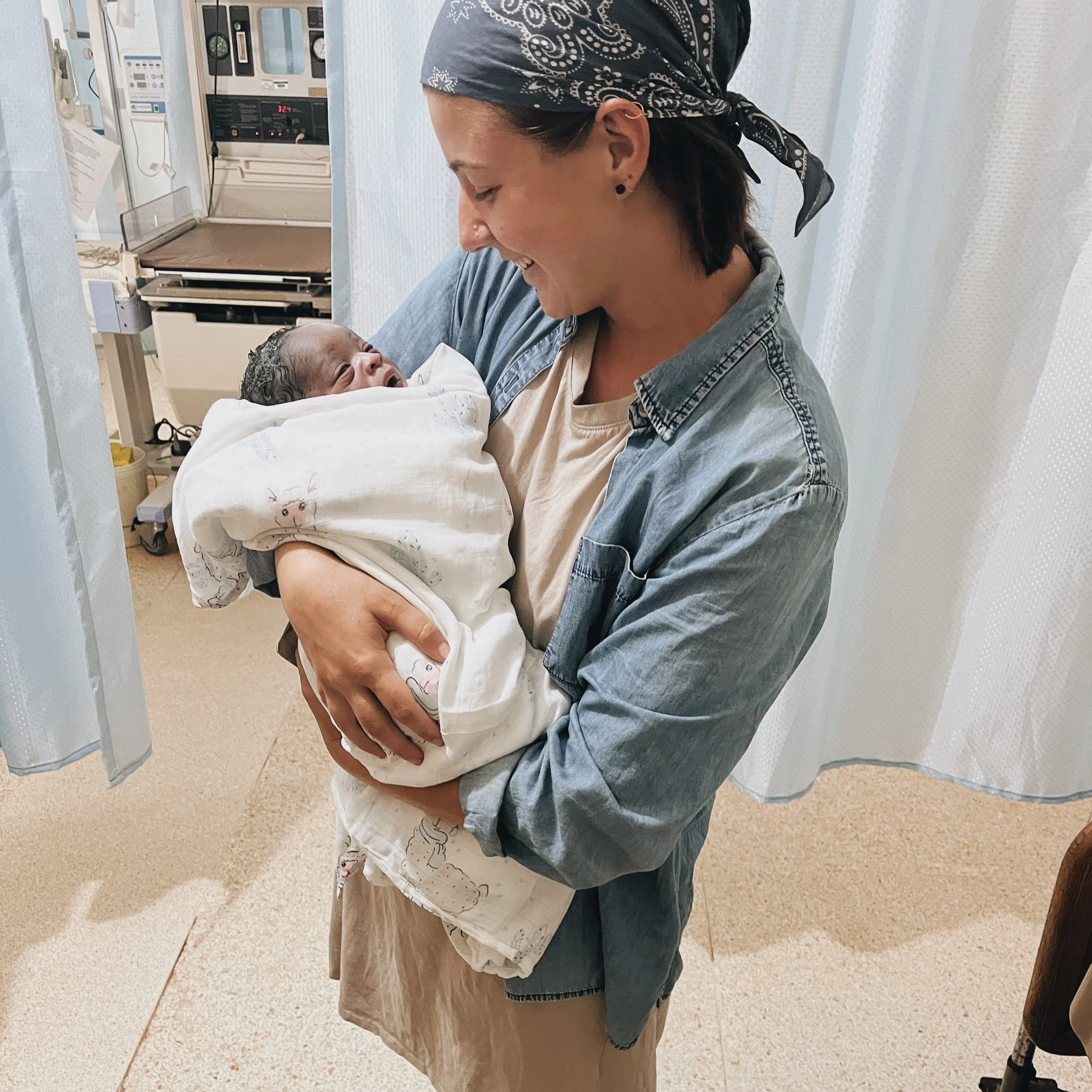 Courtlyn holding baby Arthur