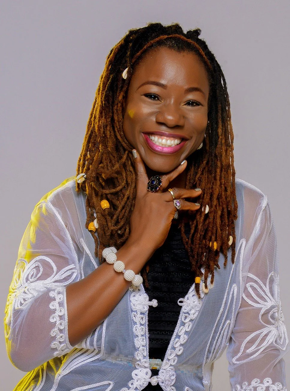 Okama Ekpe Brook headshot 1.jpeg