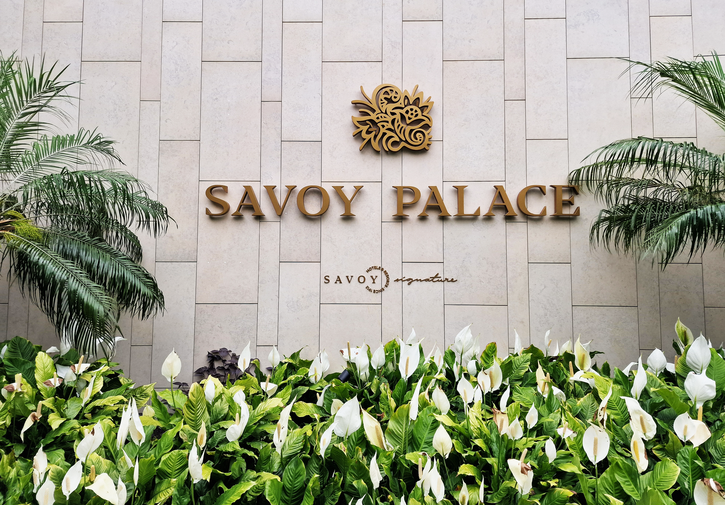 Savoy Palace Sign Front.png