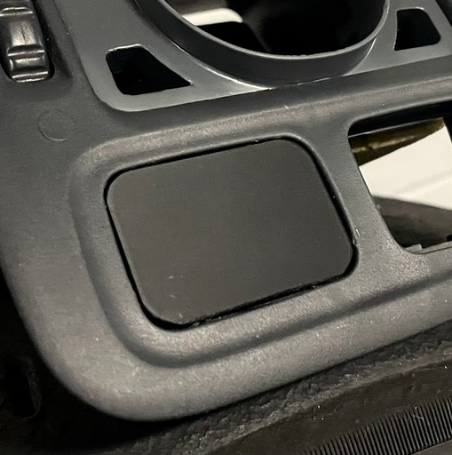 3d Print File for Button Blank on EK civic. This image shows a EK Civic airconditioning vent with a 3d printed blank plastic piece where a button should be.