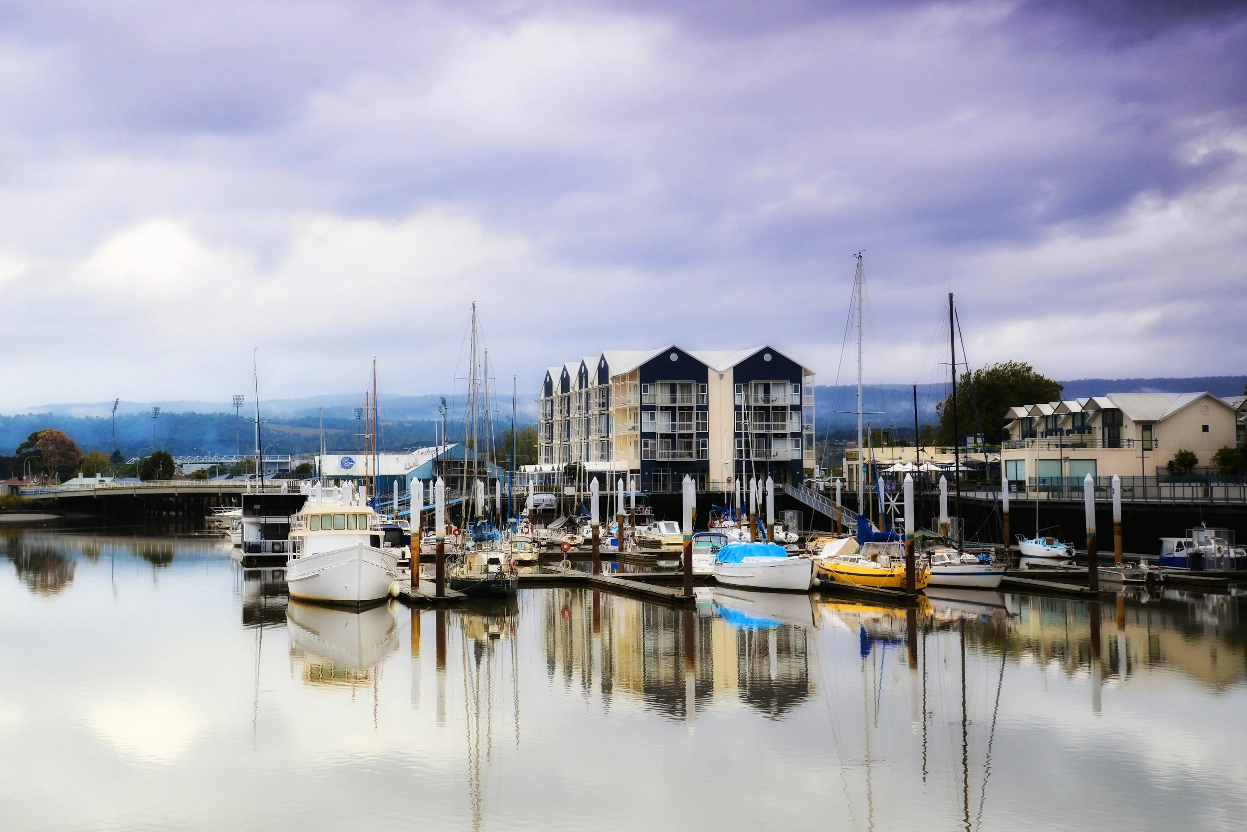 Things to do in Launceston | ART Hotel on York | Boats docked infront of the hotel and businesses at the Seaport Precinct