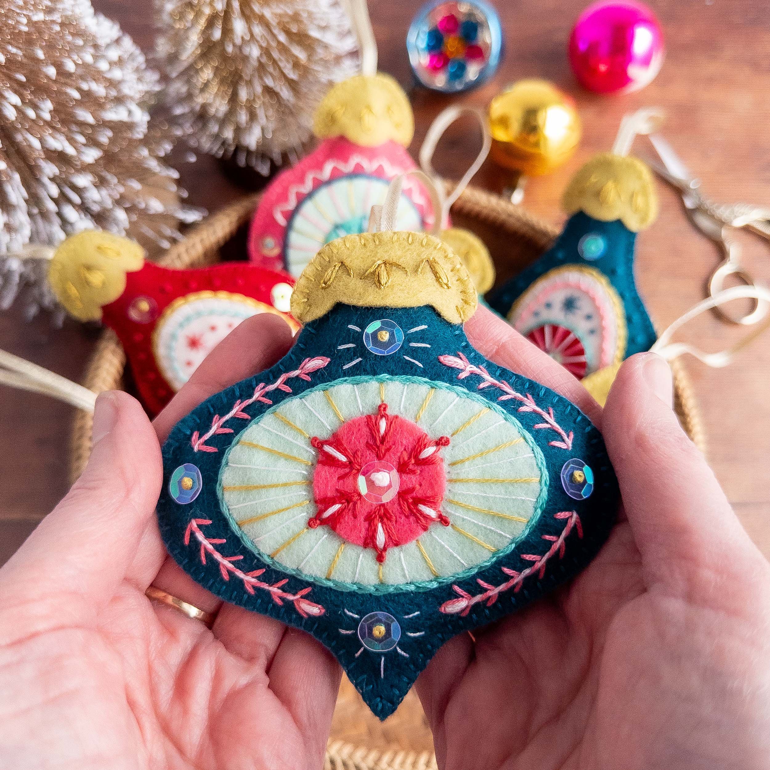 the-hoop-in-hand-embroidered-felt-bauble-in-teal-and-pink.jpg