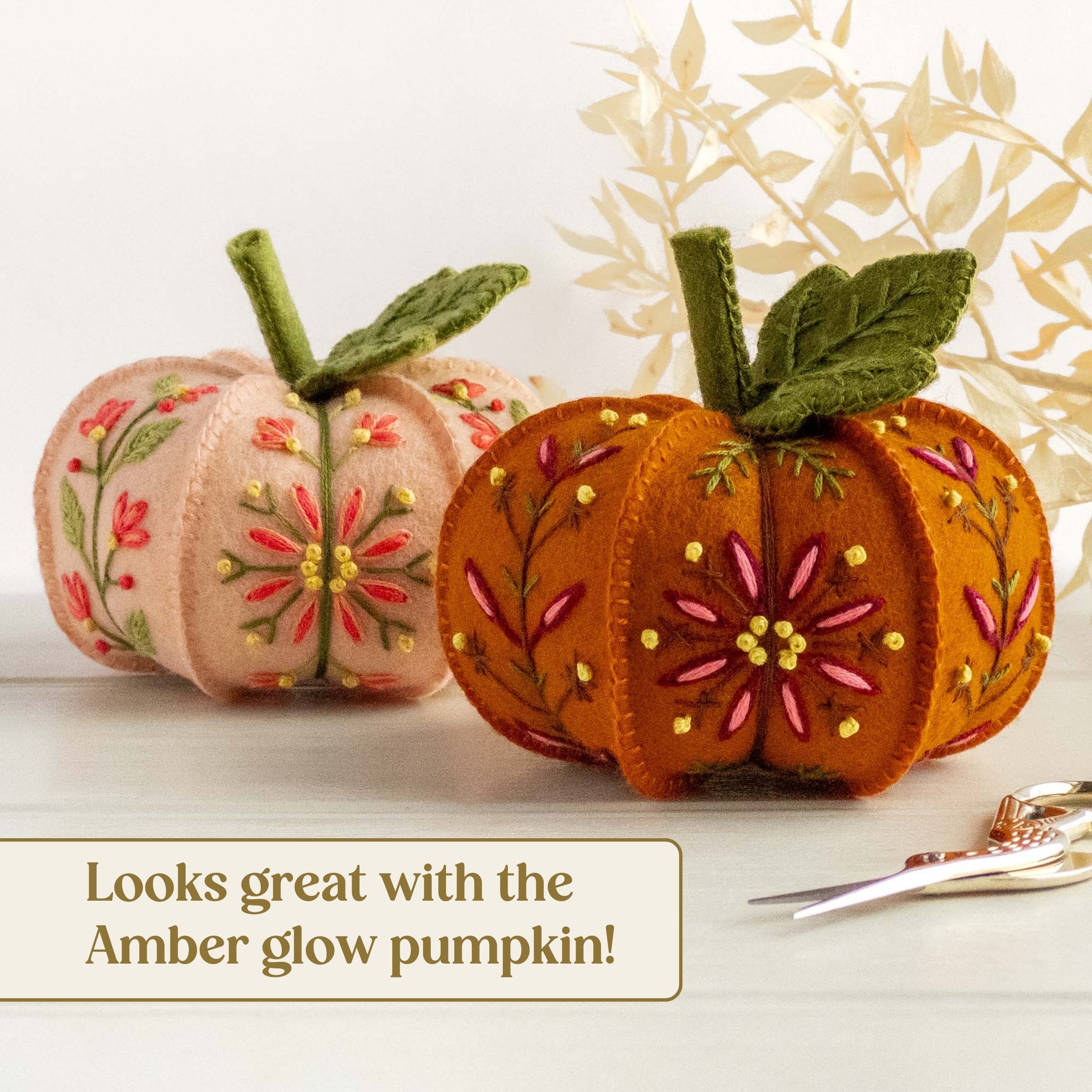 the-hoop-in-hand-embroidered-felt-pumpkin-ornaments-in-peach-and-amber.jpg