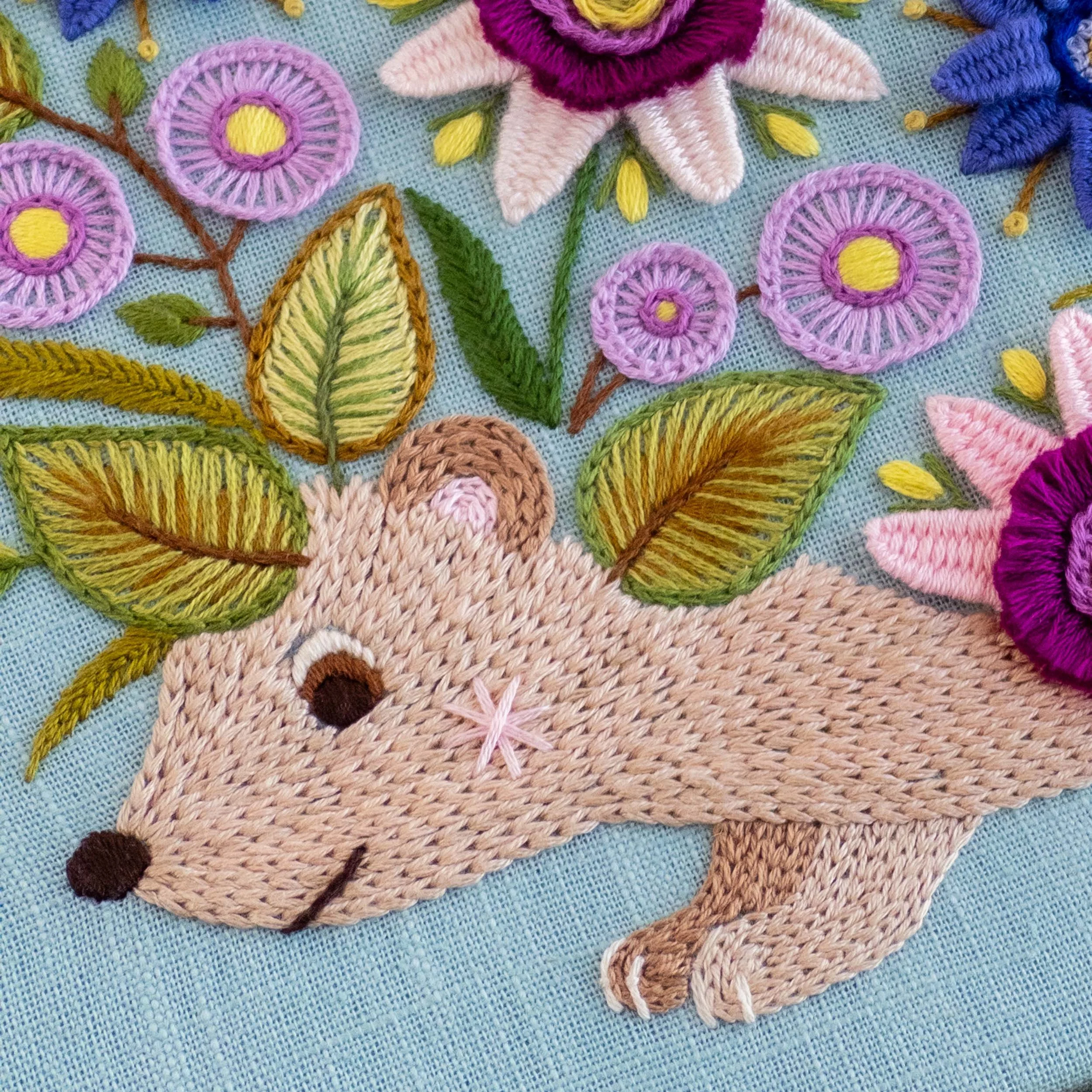 the-hoop-in-hand-floral-hedgehog-embroidery-close-up-of-face.jpg