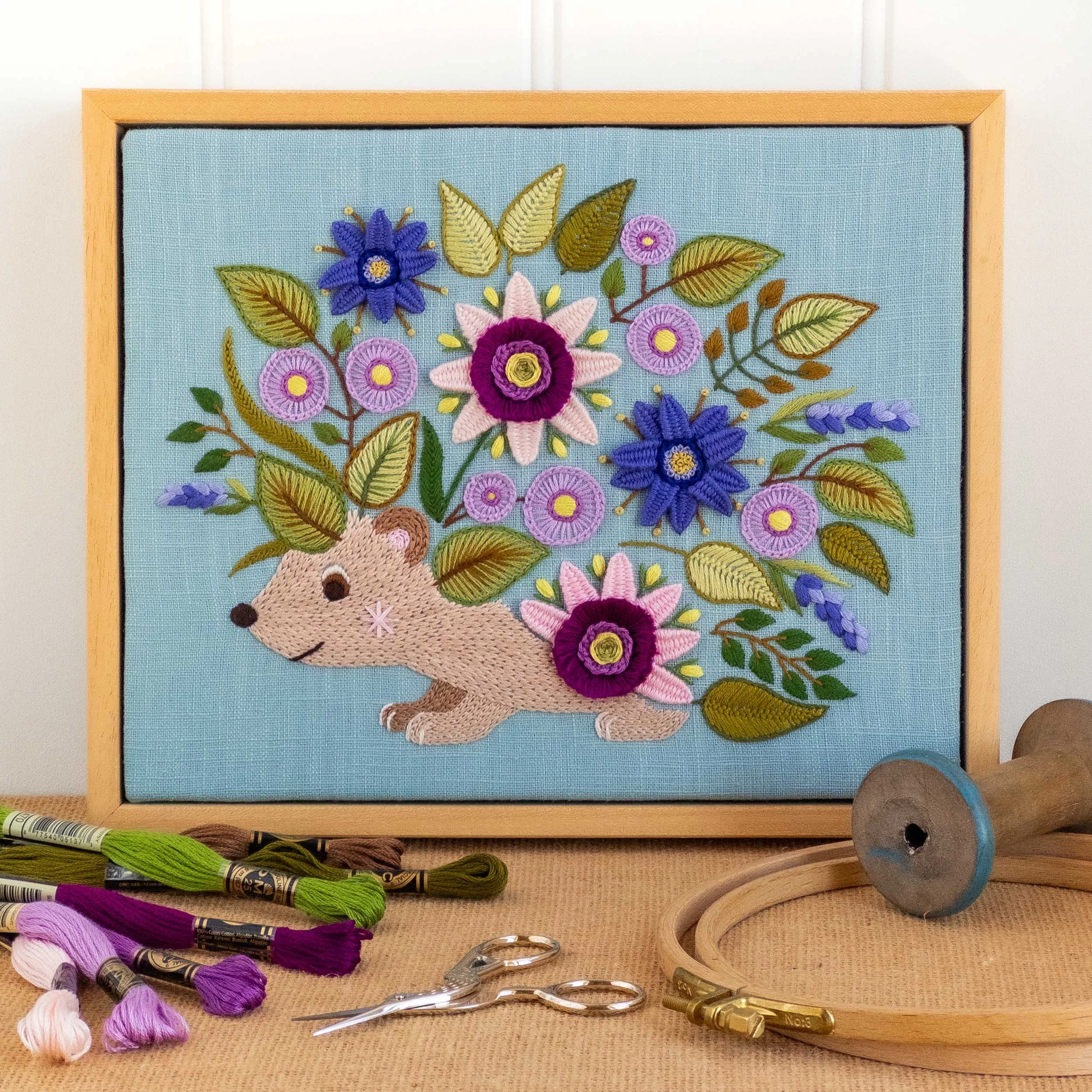 the-hoop-in-hand-floral-hedgehog-embroidery-in-wood-frame.jpg