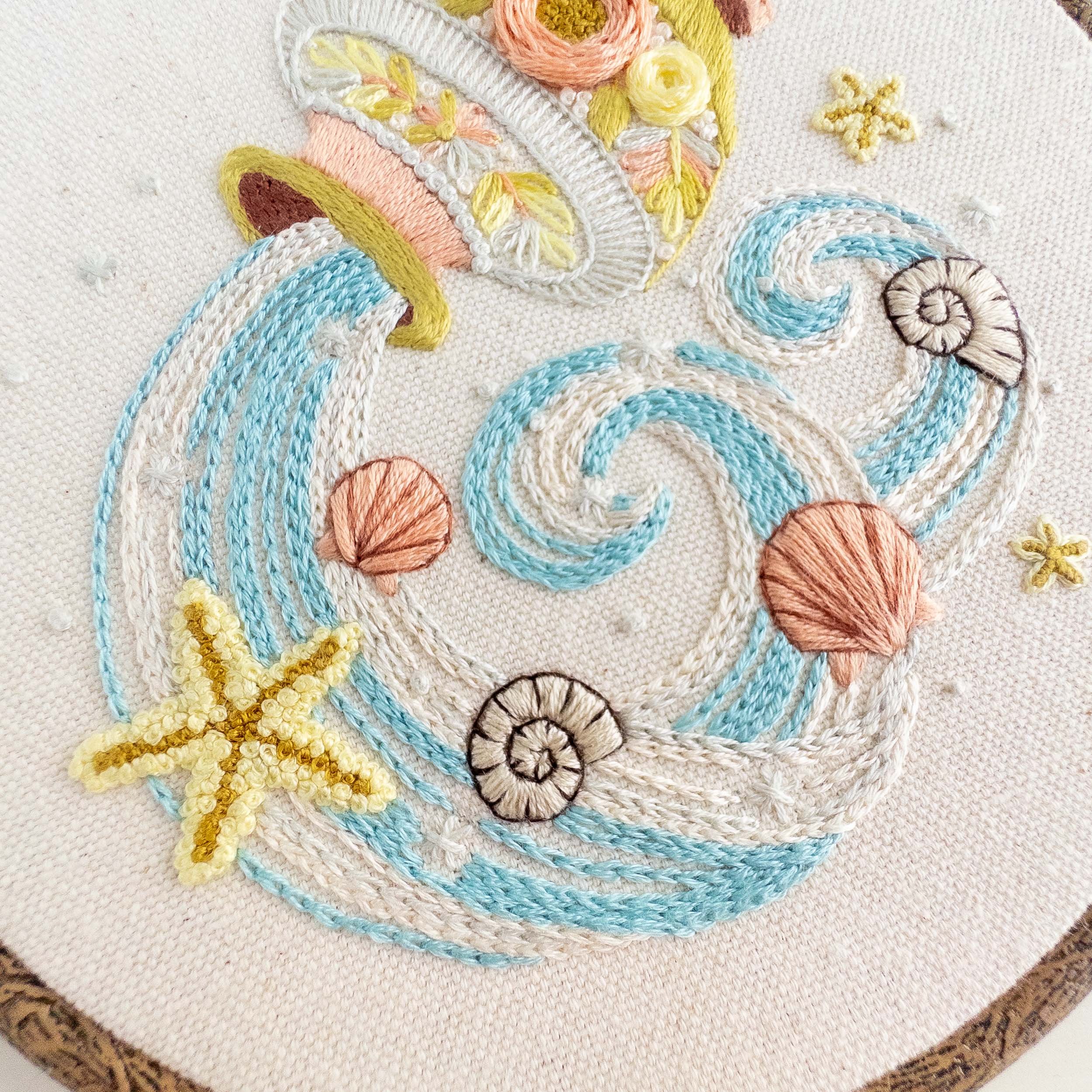 the-hoop-in-hand-zodiac-embroidery-aquarius-design-with-shells.jpg