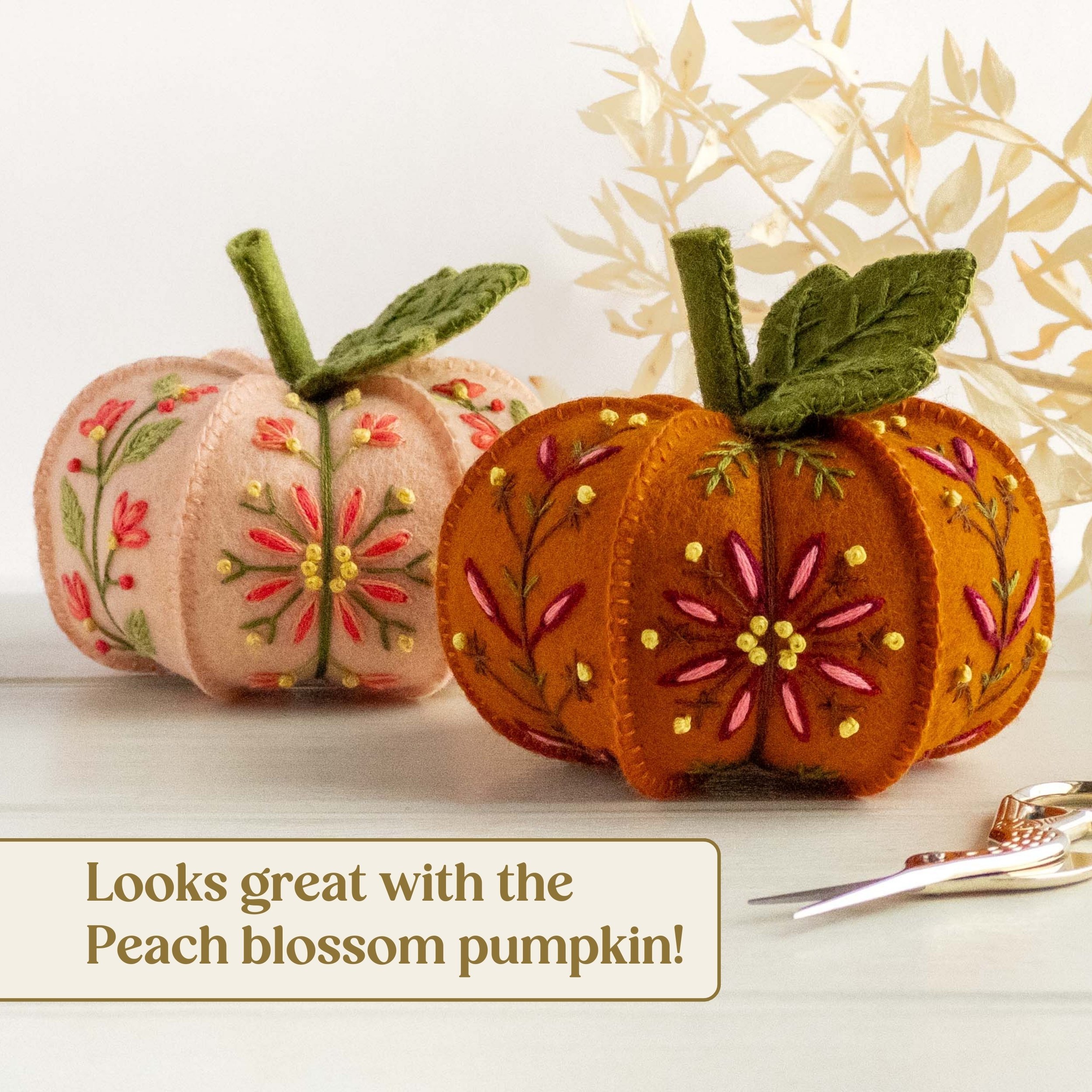 the-hoop-in-hand-embroidered-felt-pumpkin-ornaments-in-amber-and-peach.jpg