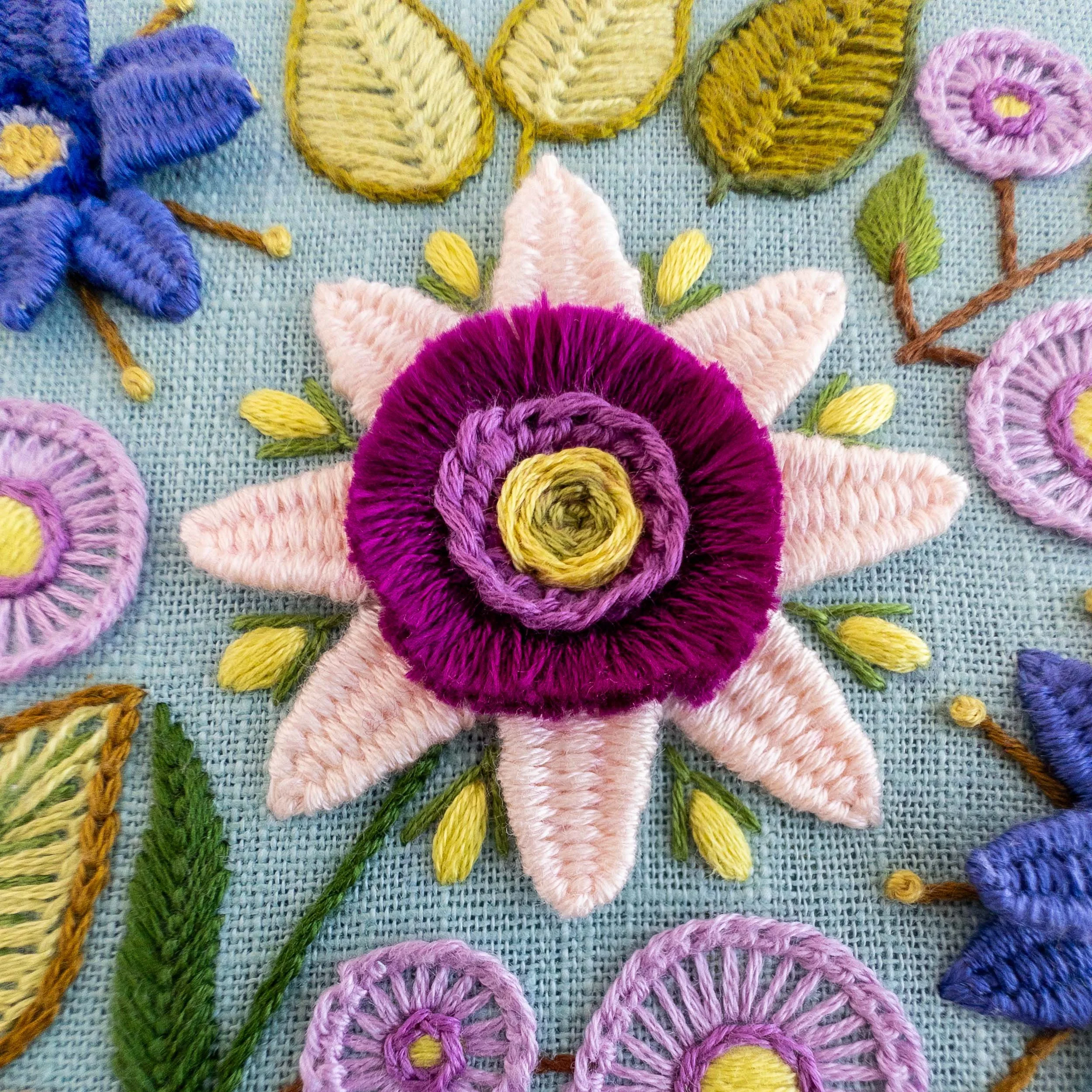 the-hoop-in-hand-floral-hedgehog-embroidery-close-up-pink-flower.jpg