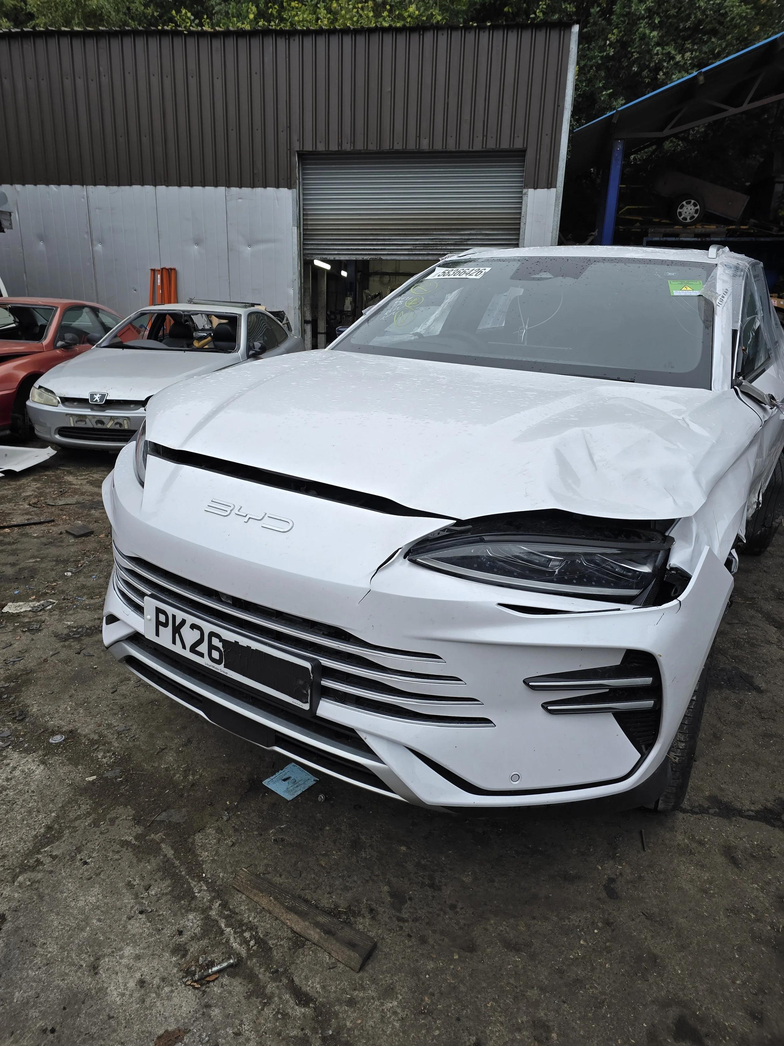 BYD Seal U in white crash damaged being broken for parts