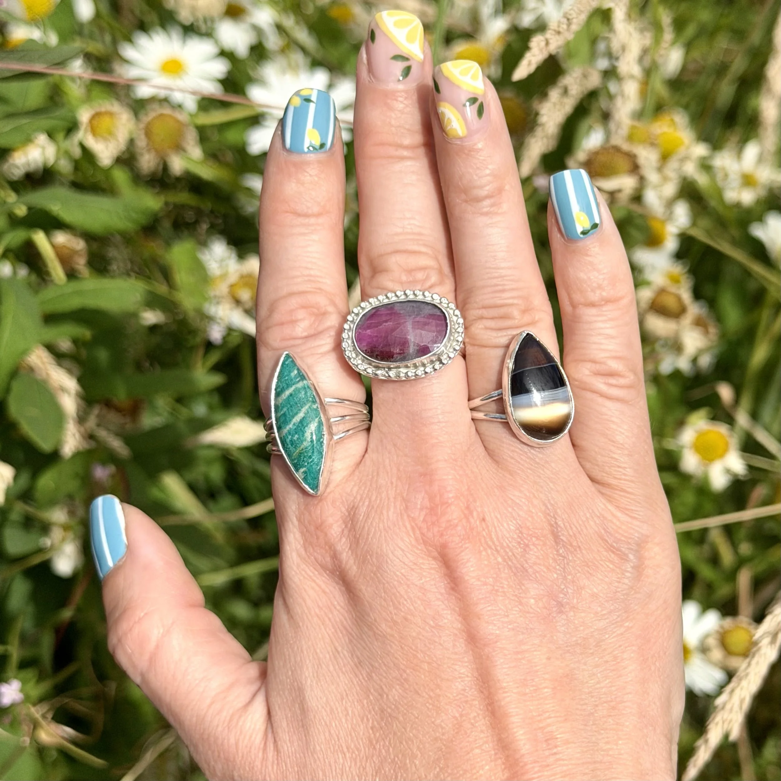 Colourful handmade sterling silver rings, amazonite, sapphire and banded agate. https://www.ivycolejewellery.co.uk/shop