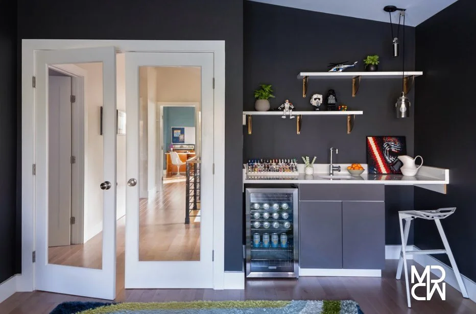 Who says kids&rsquo; spaces can&rsquo;t have style and function?
These playrooms were designed to grow with them - they are cool, creative, and my kids totally approve.
 We went bold with really dark almost black walls, layered in mid-century pieces,