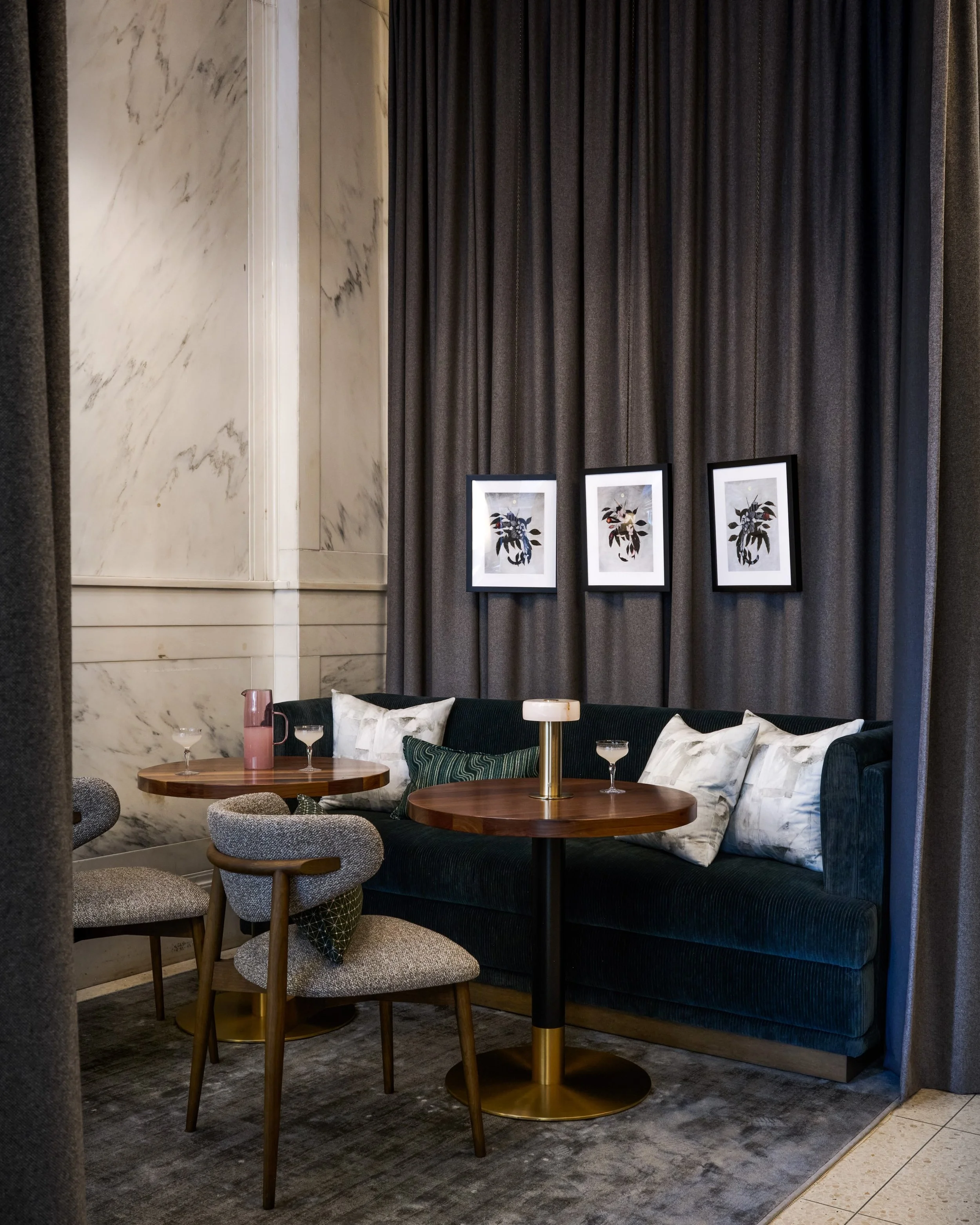 Swipe for the before ✨
Our client&rsquo;s goal for this building lobby was to bring warmth so that people will want to actually linger instead of purely passing through. We added drapery to separate spaces and layered warm materials to create that co
