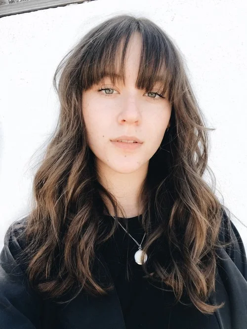 layered haircut with bangs