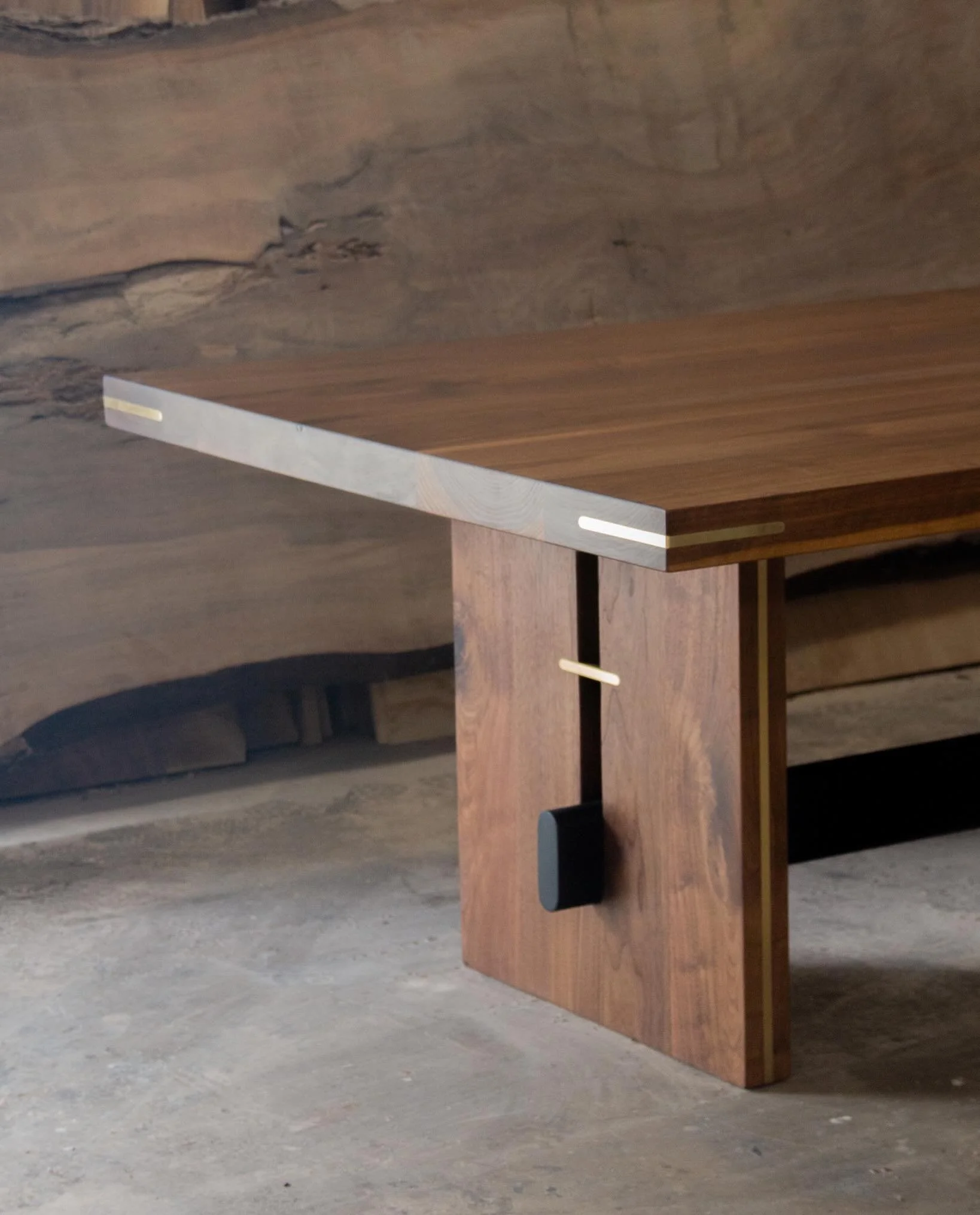 Custom commissioned solid walnut dining table with brass inlays and ebonized walnut stringer. // we worked with the client to create a fully one of a kind table. We pulled Inspo from some older pieces she had in her home as well as other objects we c