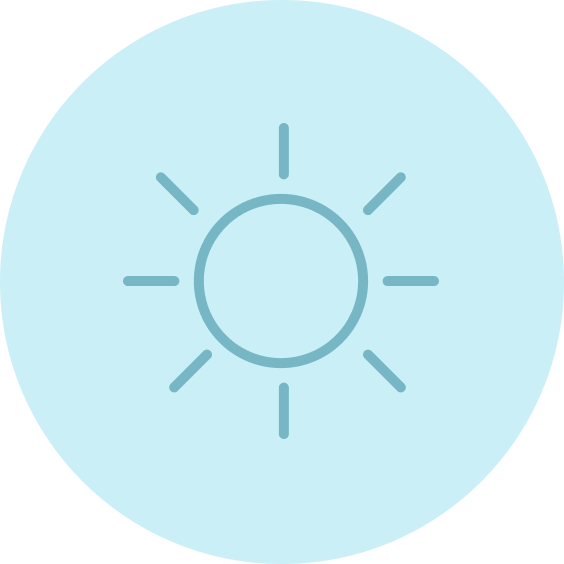 A simple line drawing of a sun with rays extending outward, on a light blue circular background.