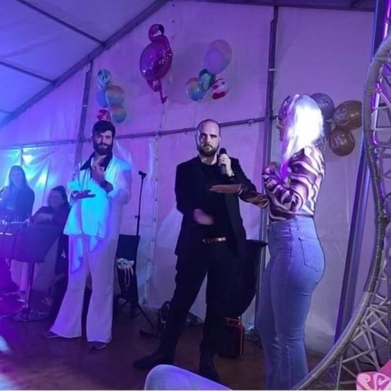 David Peace performing at a 30th birthday party