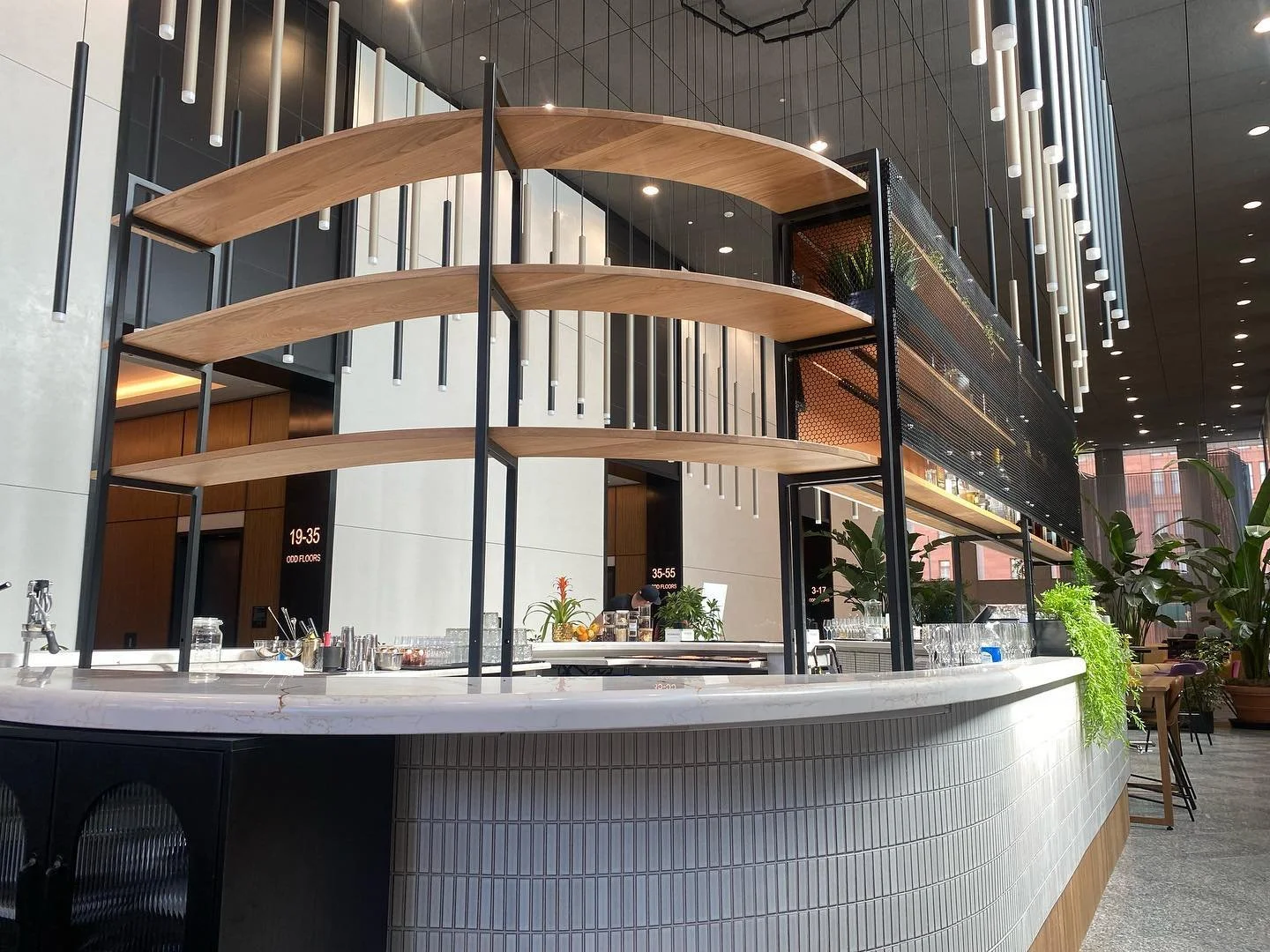 We built some curved shelving for the Done Deal bar downtown. Merritt built the legs for us