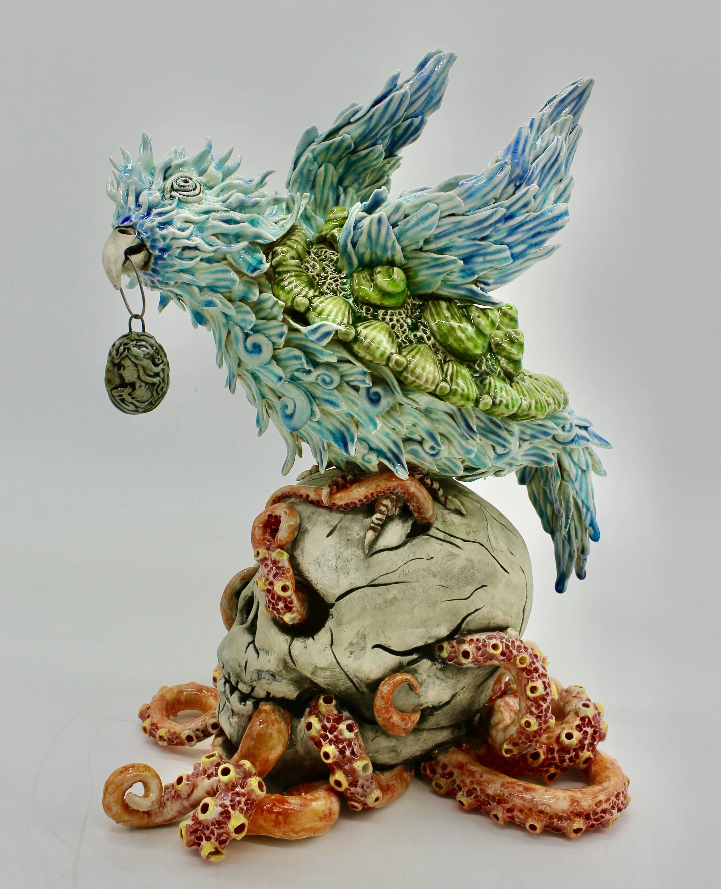 "The bird, a symbol of freedom and flight, grapples with the burden of a shell—a protective armor forged by necessity. The turtle’s hard casing, once a sanctuary, now bears witness to the scars of survival. The octopus tentacles, sinuous and relentle