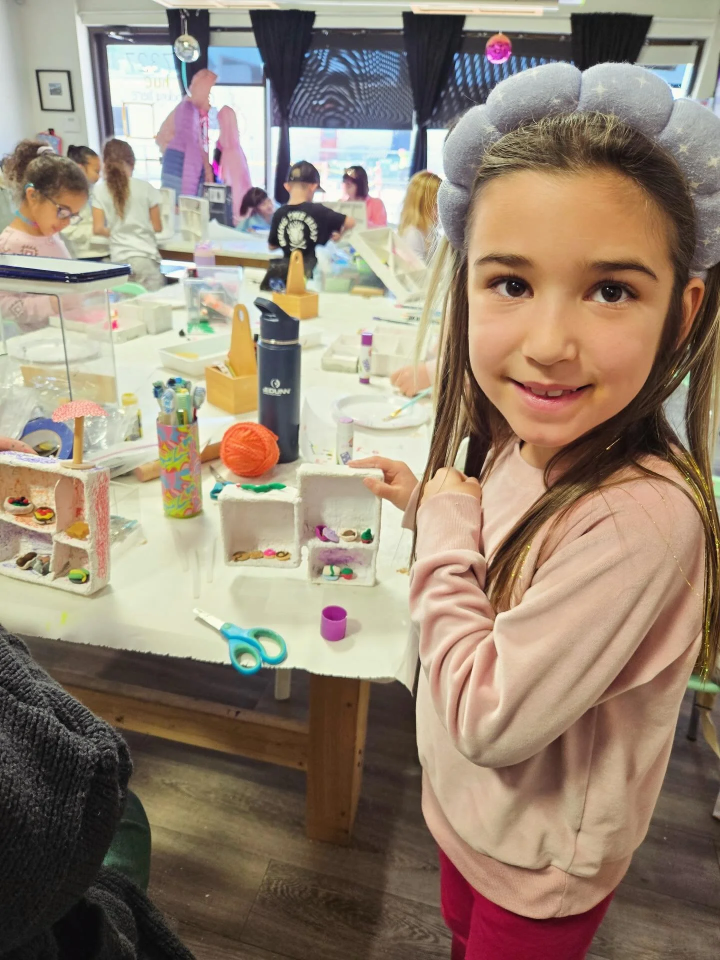 Spring break camps kicked off with March Miniature Madness!  Artists designed and built the shelves for all their curiosities with cardboard and plaster embedded gauze. They were encouraged to make miniatures of everyday items that interested them. 
